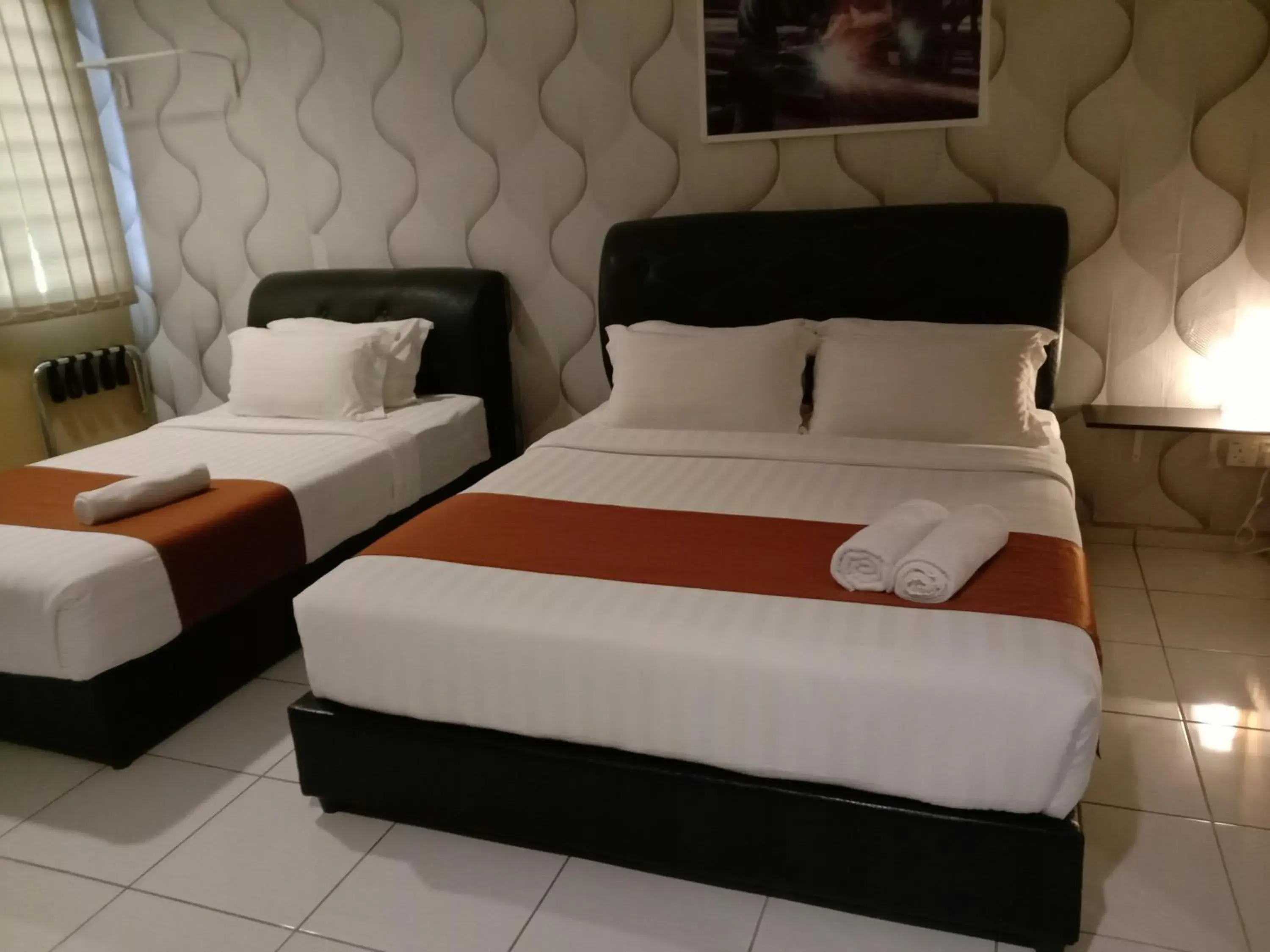 Bed in NDE Hotel Bed in NDE Hotel