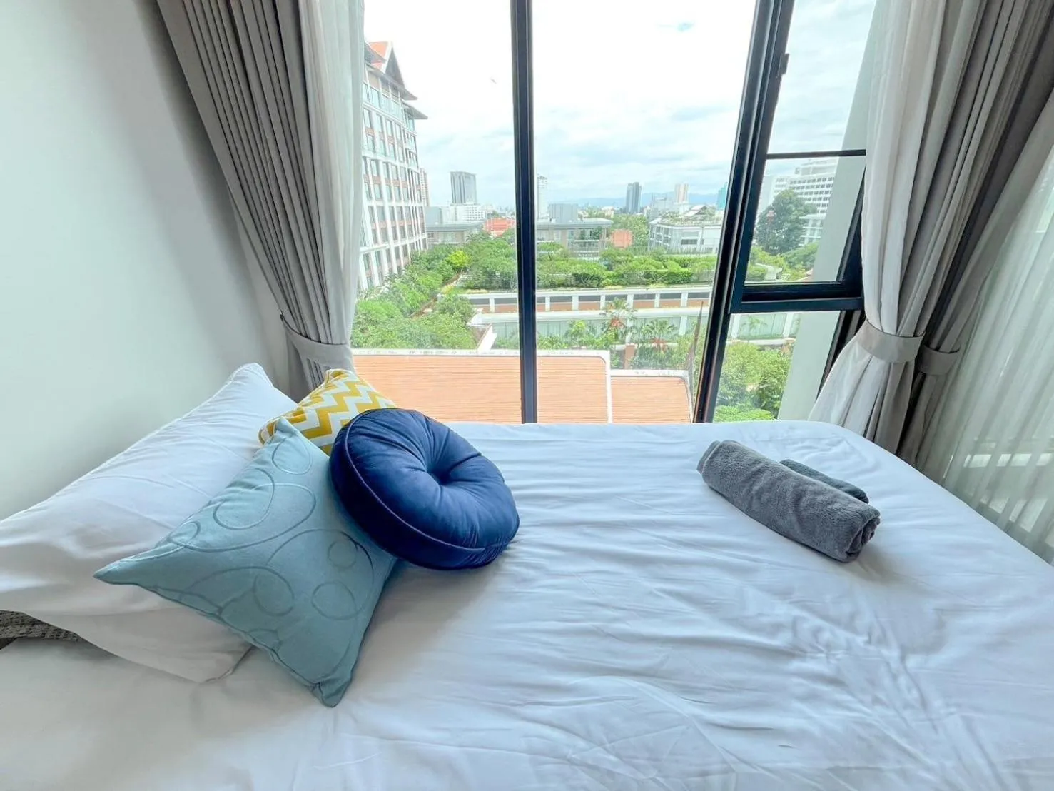 View (from property/room), Bed in The Astra Residence