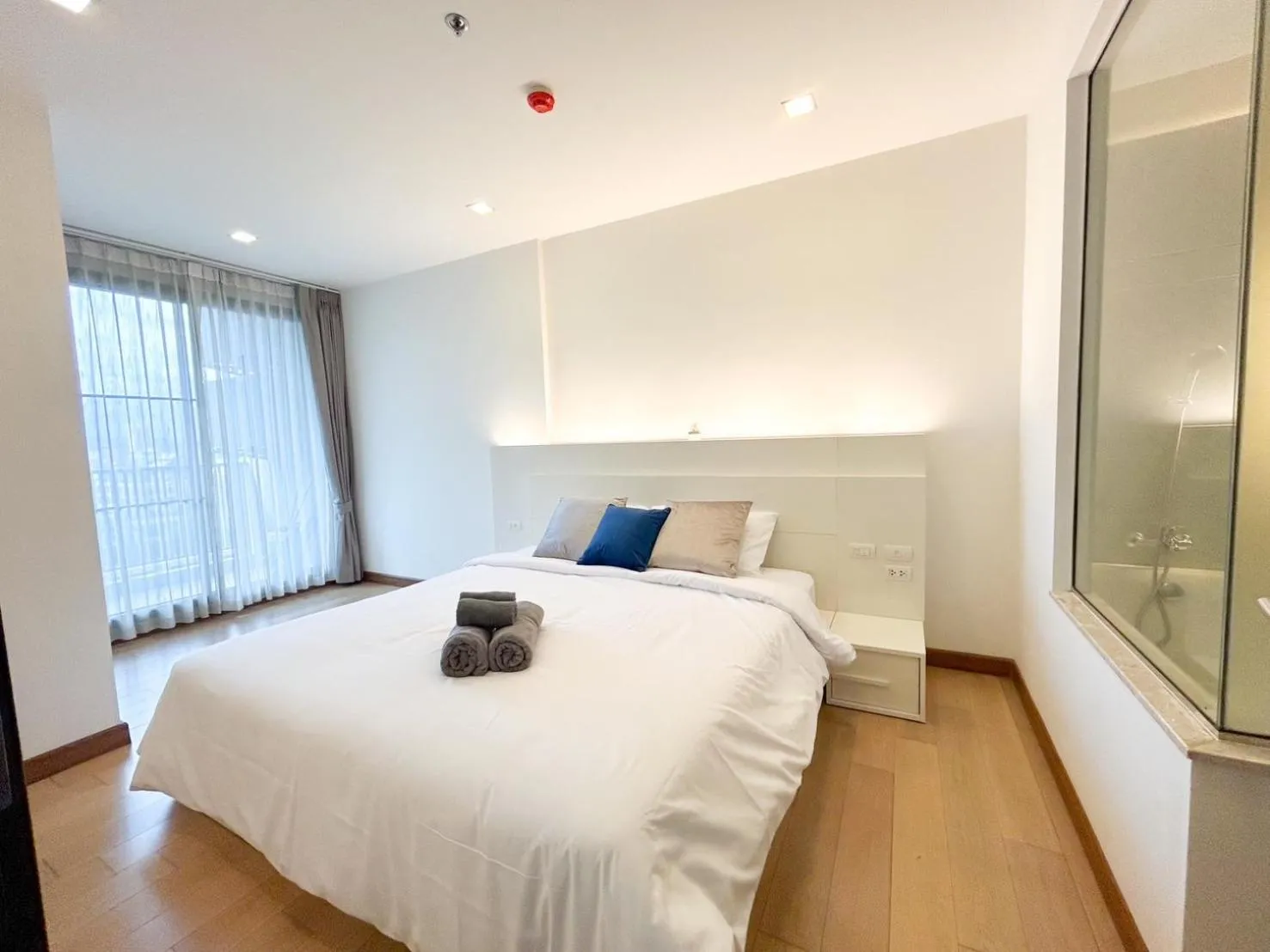 Bed in The Astra Residence