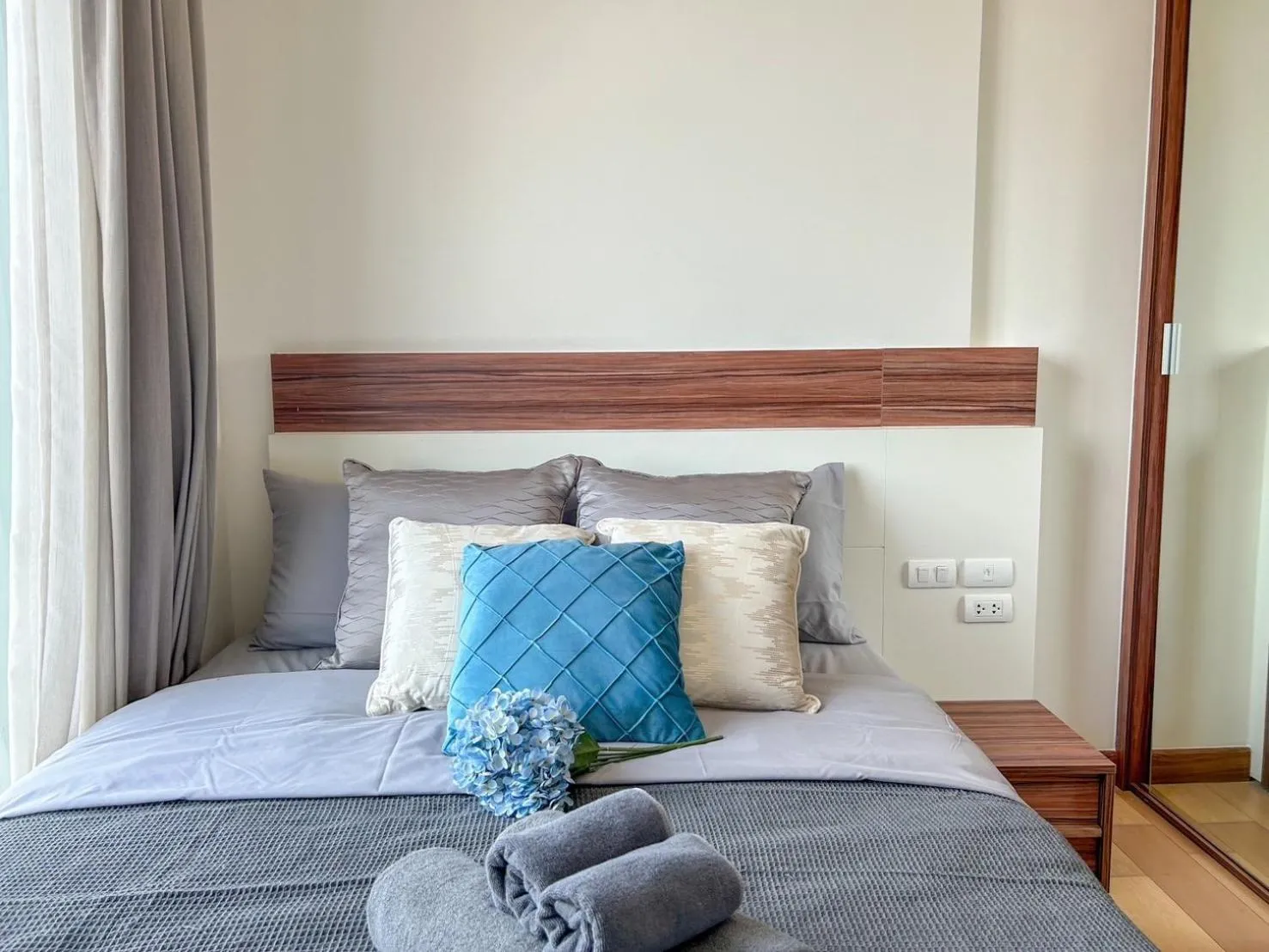 Bed in The Astra Residence