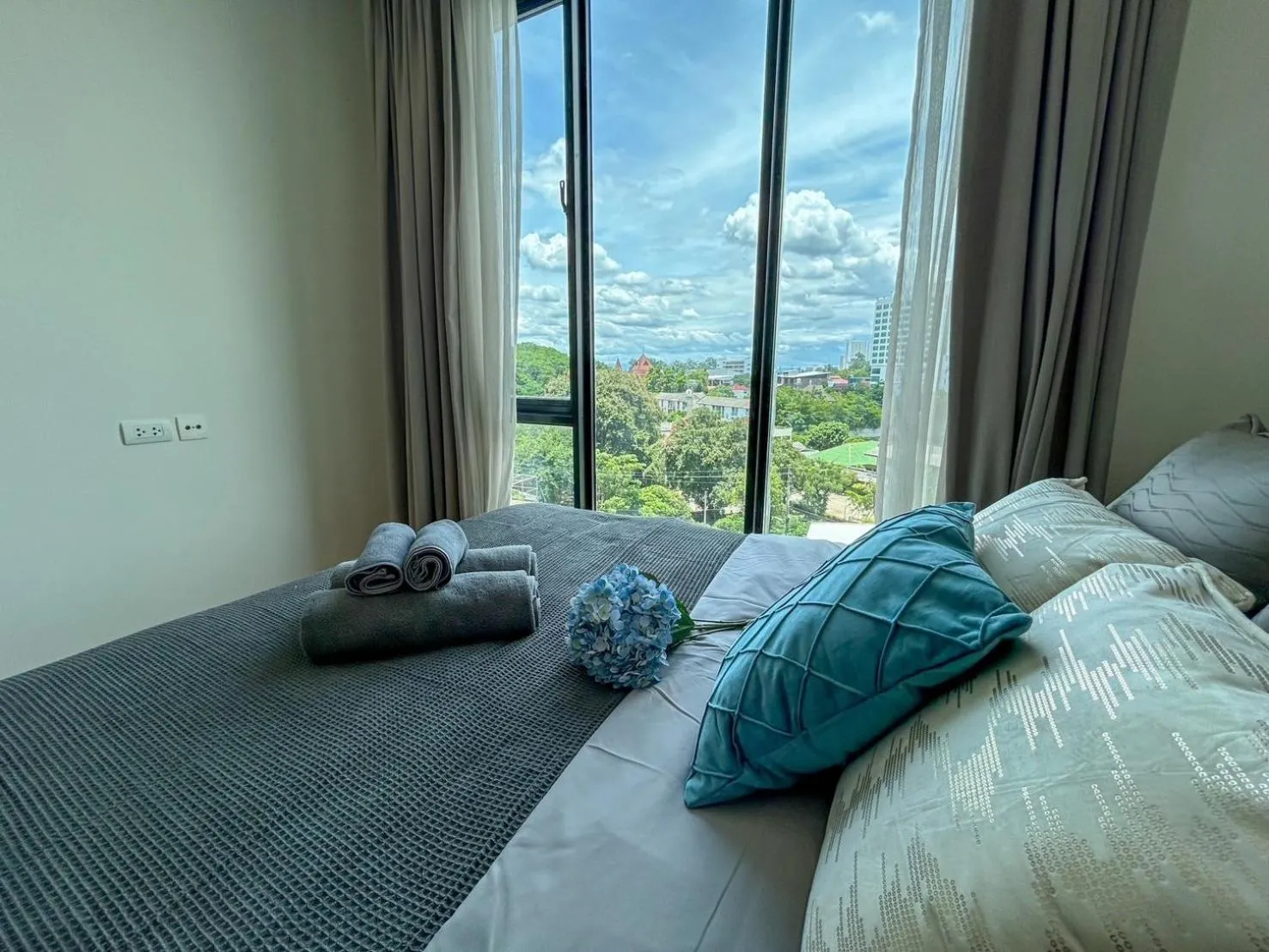 Bed in The Astra Residence