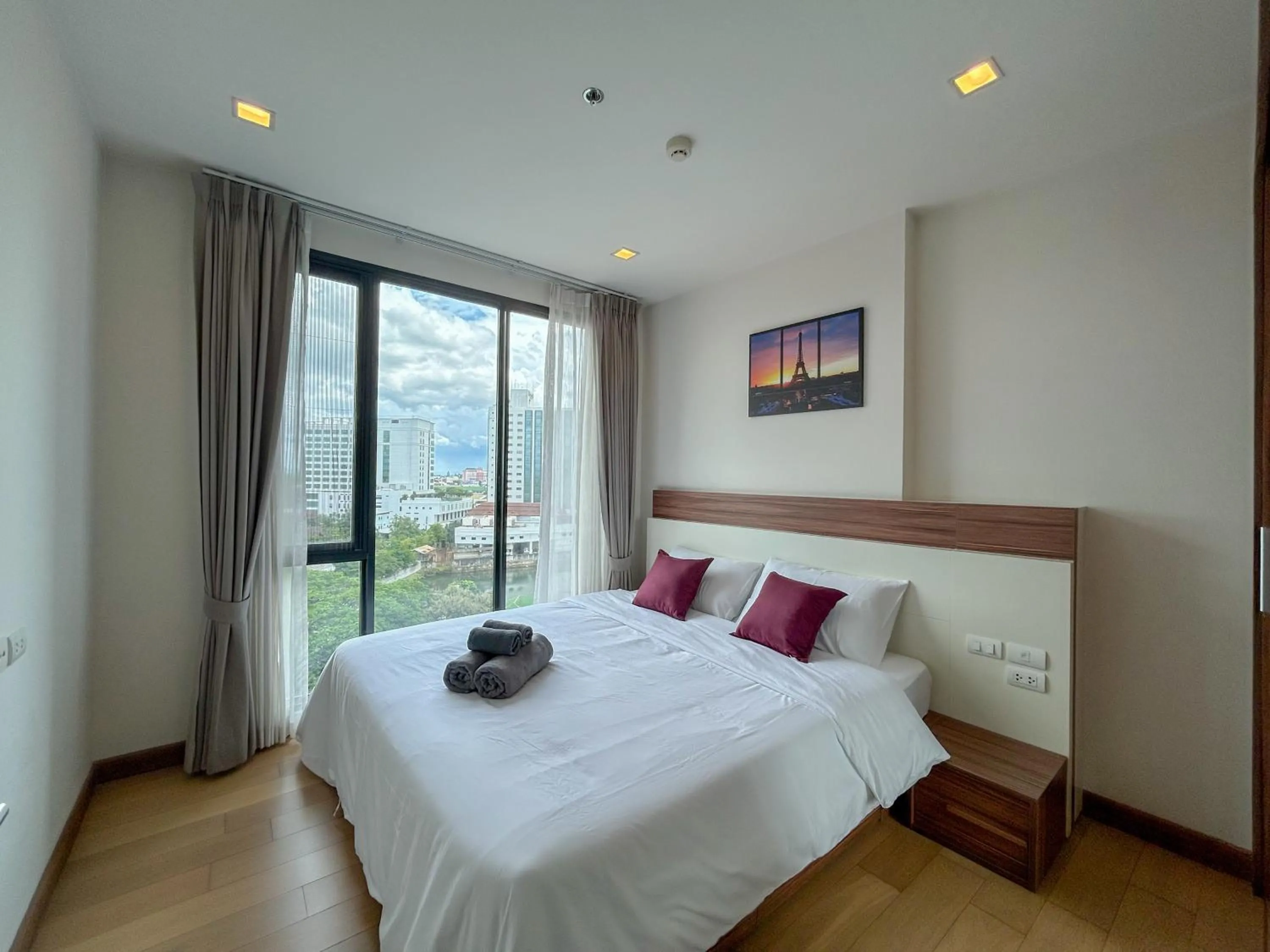 Bed in The Astra Residence