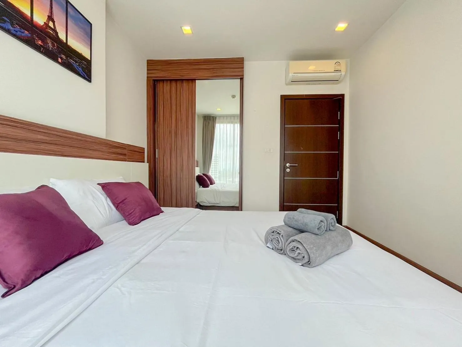 Bed in The Astra Residence