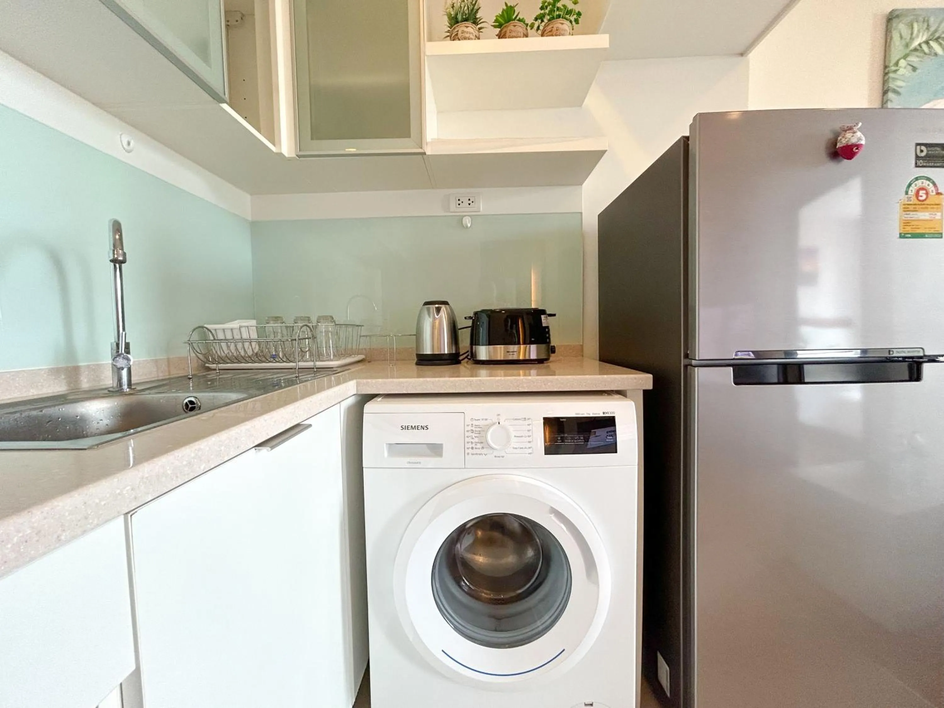 Kitchen or kitchenette in The Astra Residence