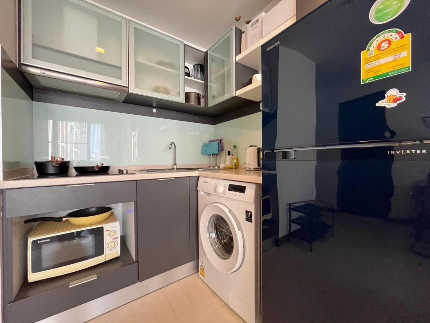 Kitchen or kitchenette in The Astra Residence