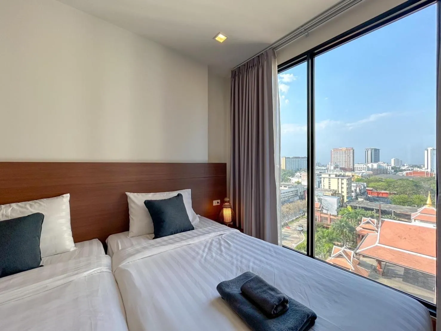 Bed in The Astra Residence