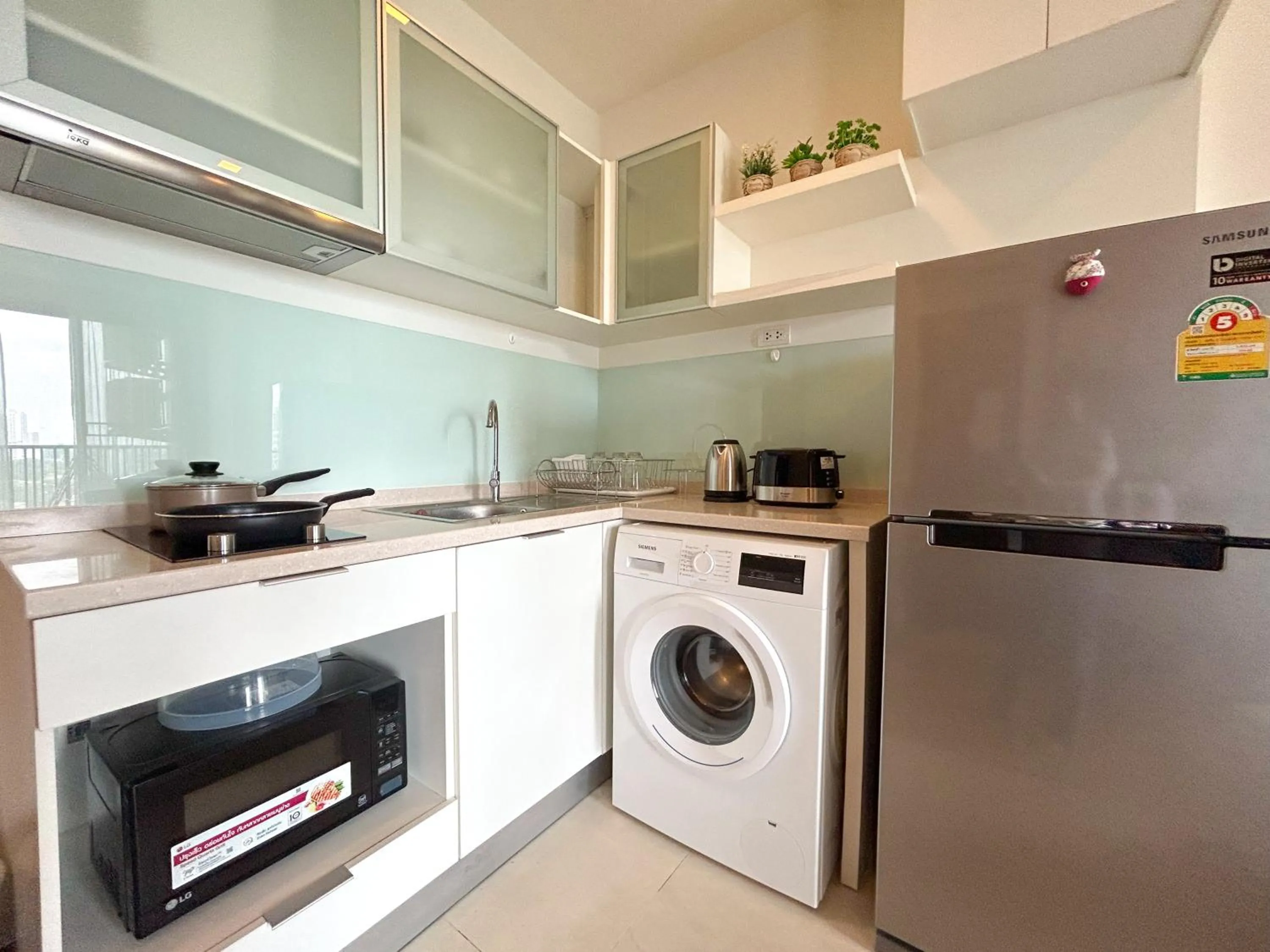 Kitchen or kitchenette in The Astra Residence