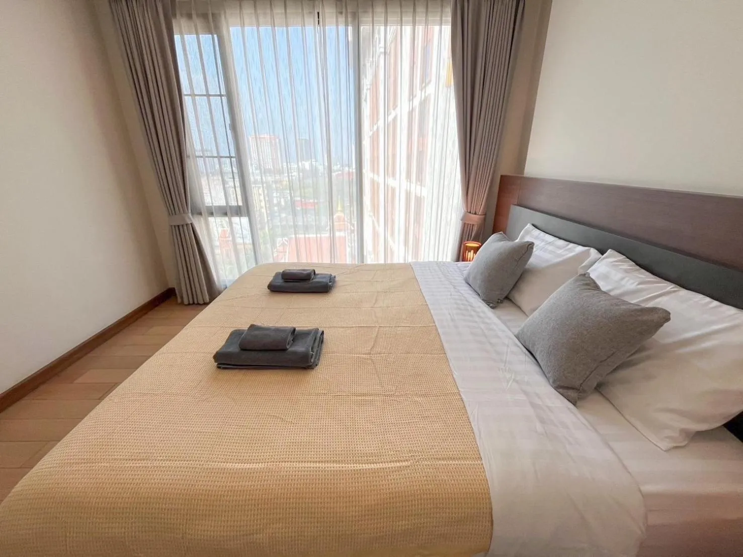 Photo of the whole room, Bed in The Astra Residence
