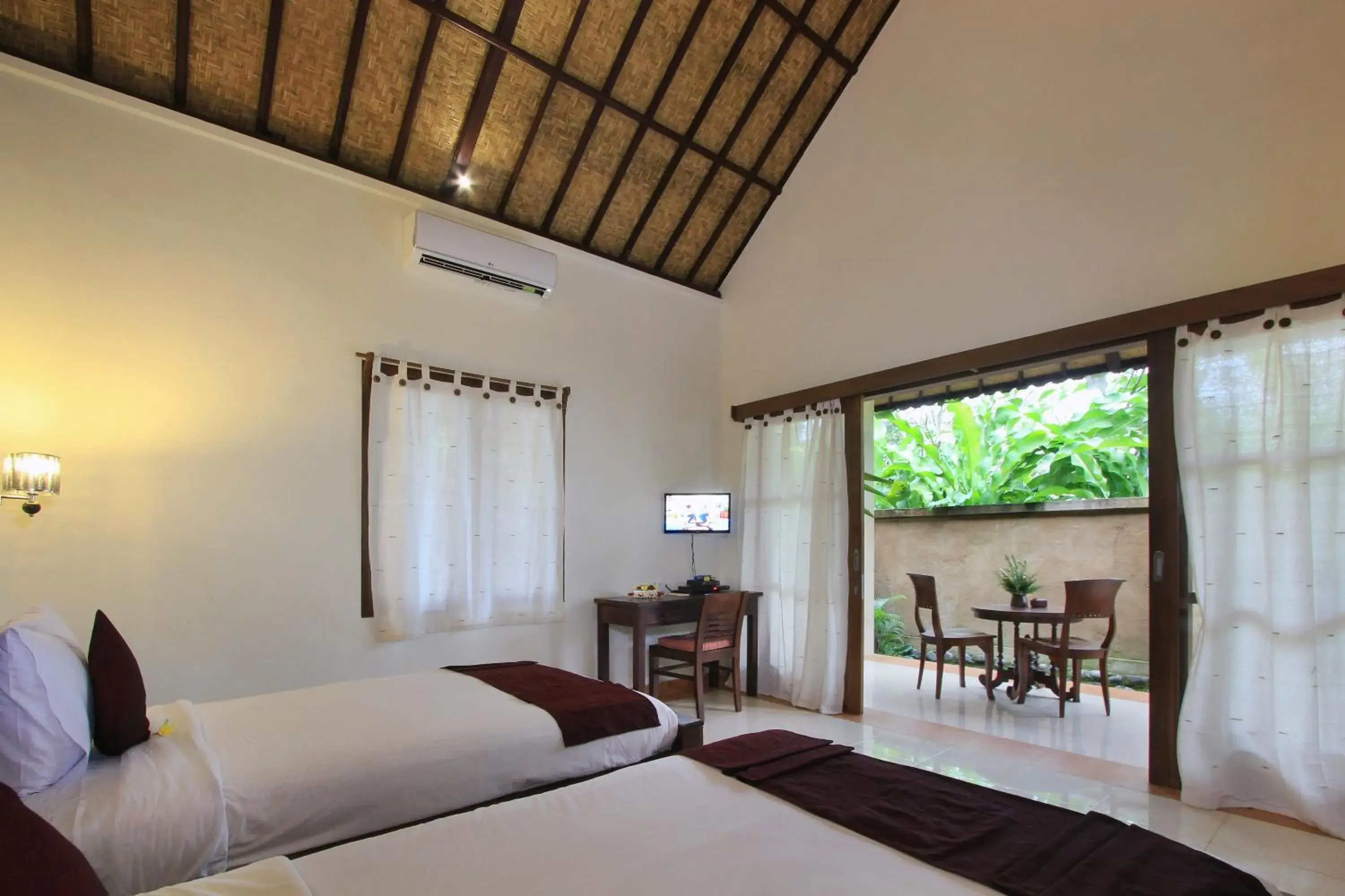 Bed in Chili Ubud Cottage Bed in Chili Ubud Cottage