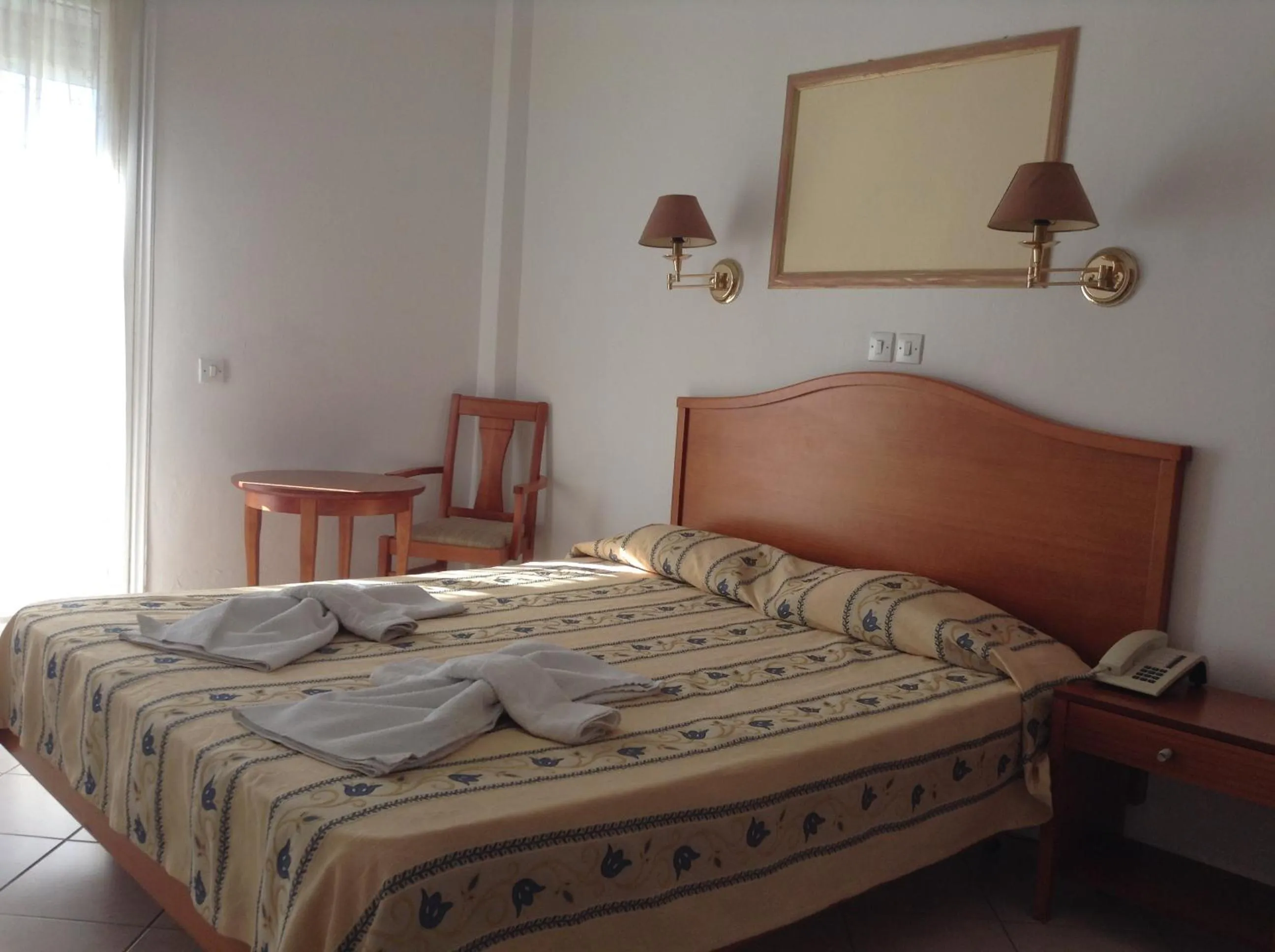 Bed in Hotel Meltemi