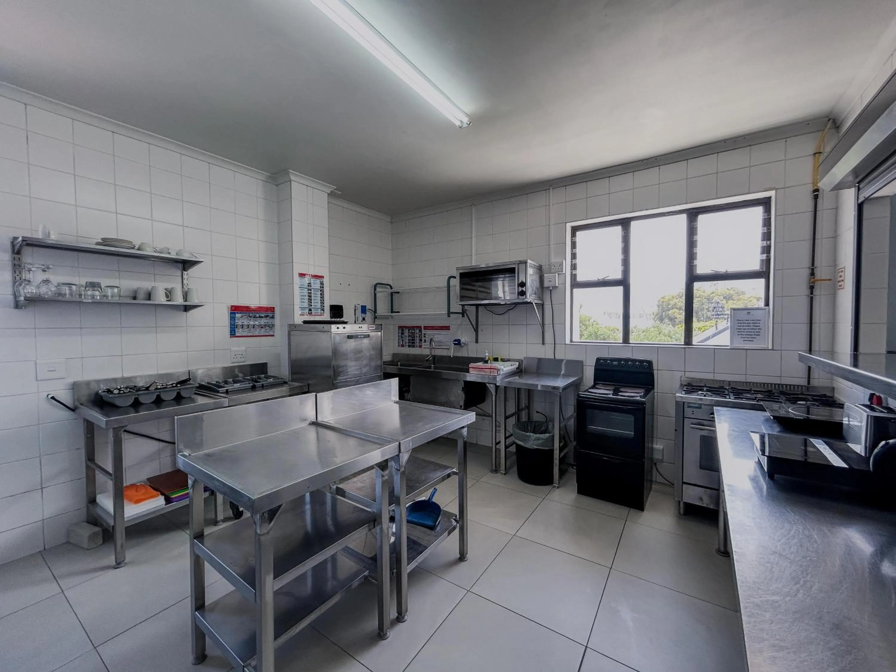 Communal kitchen in Zzzone Boutique Hostel