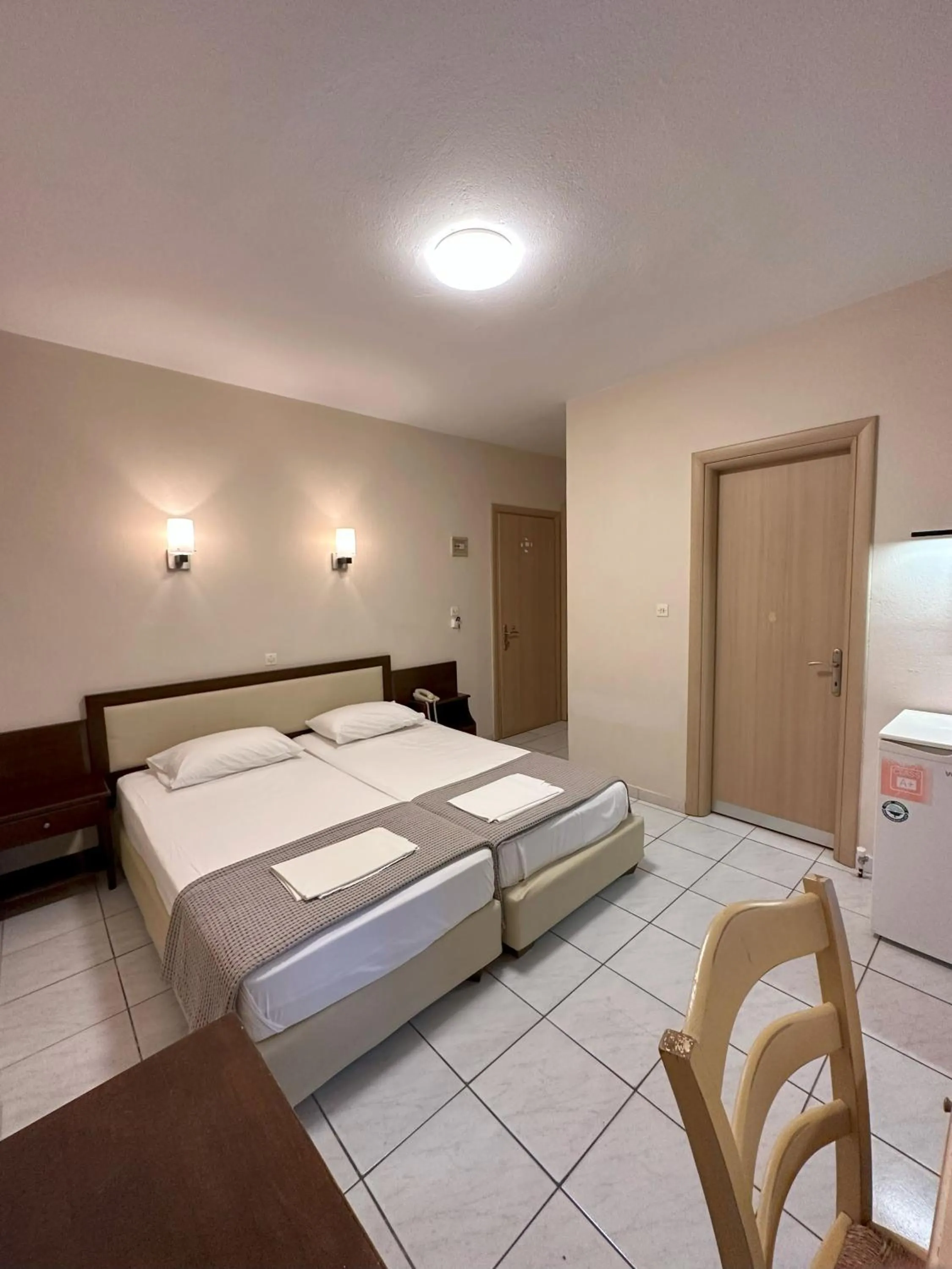 Bed in Hotel Afrodite