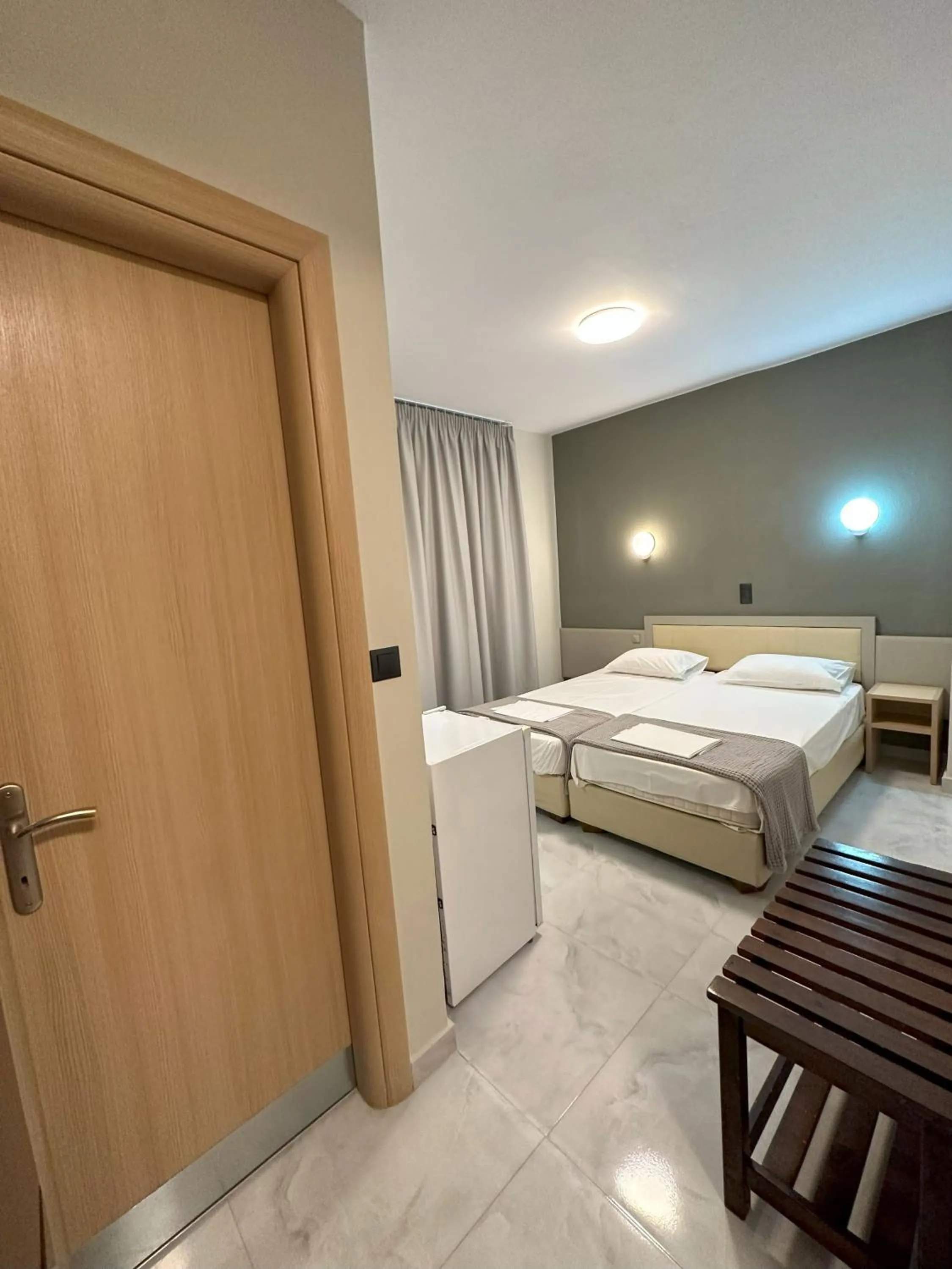 Bed in Hotel Afrodite