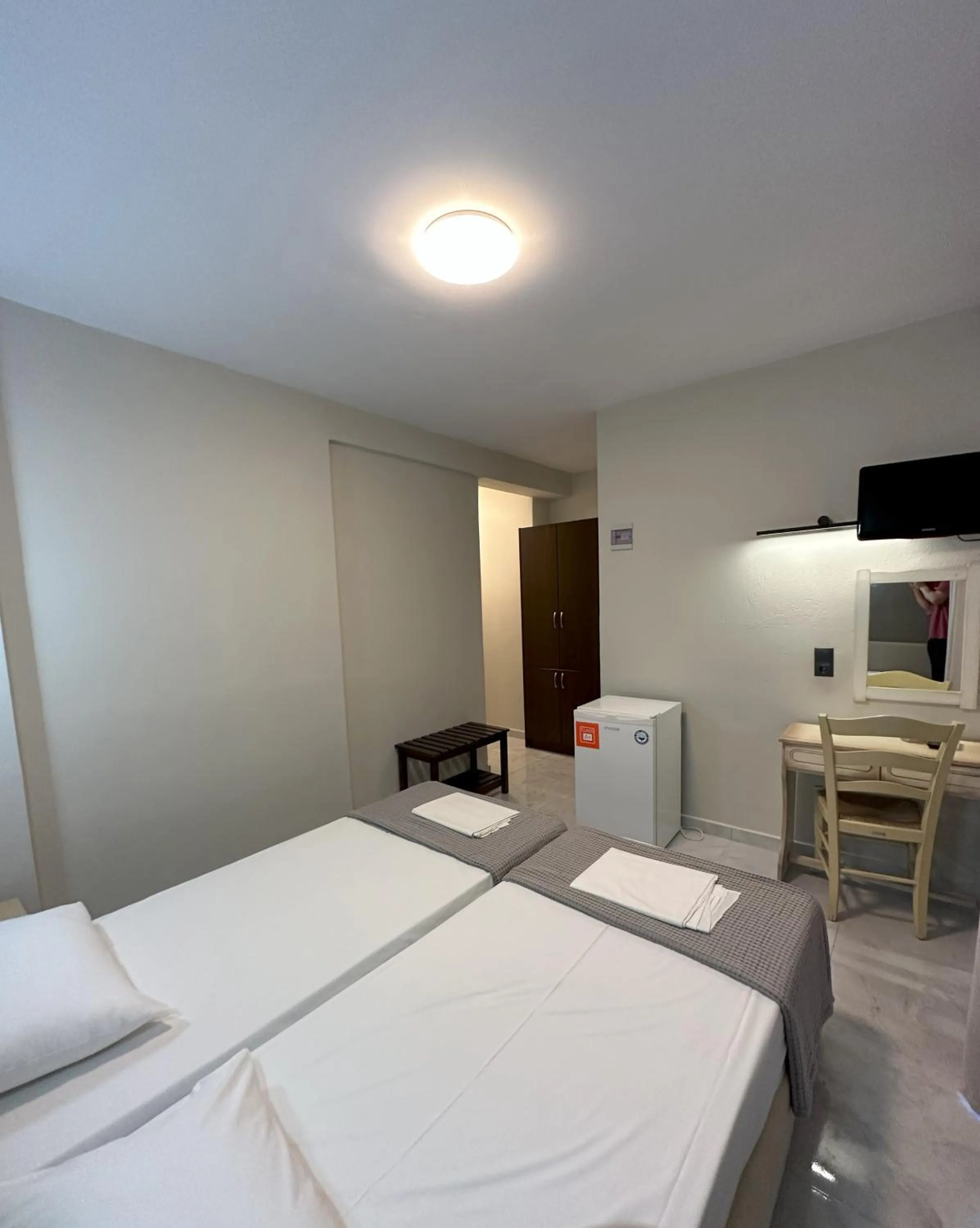 Bed in Hotel Afrodite