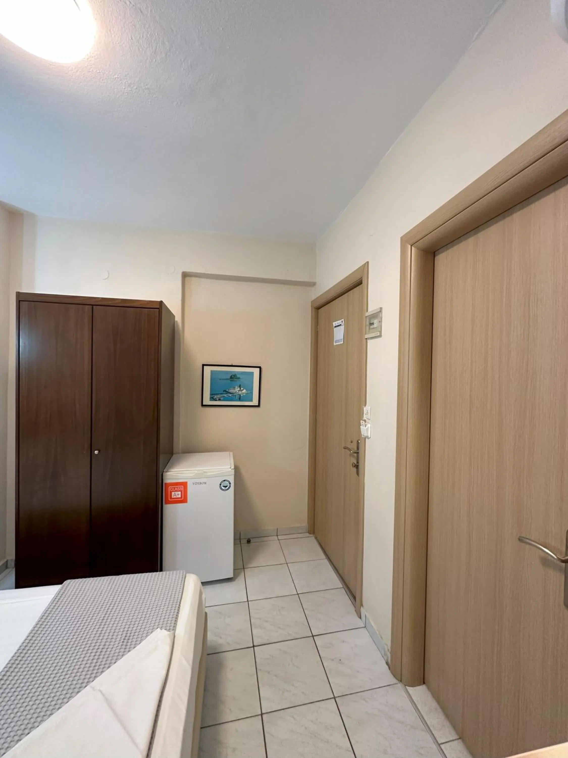 Bed in Hotel Afrodite