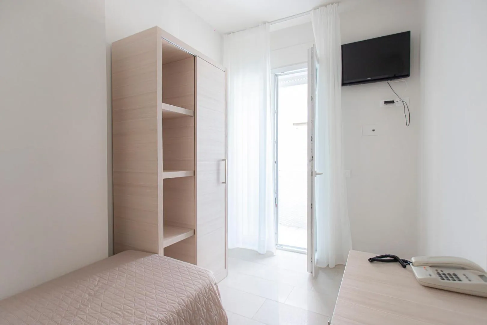 Bed in Hotel Primiana