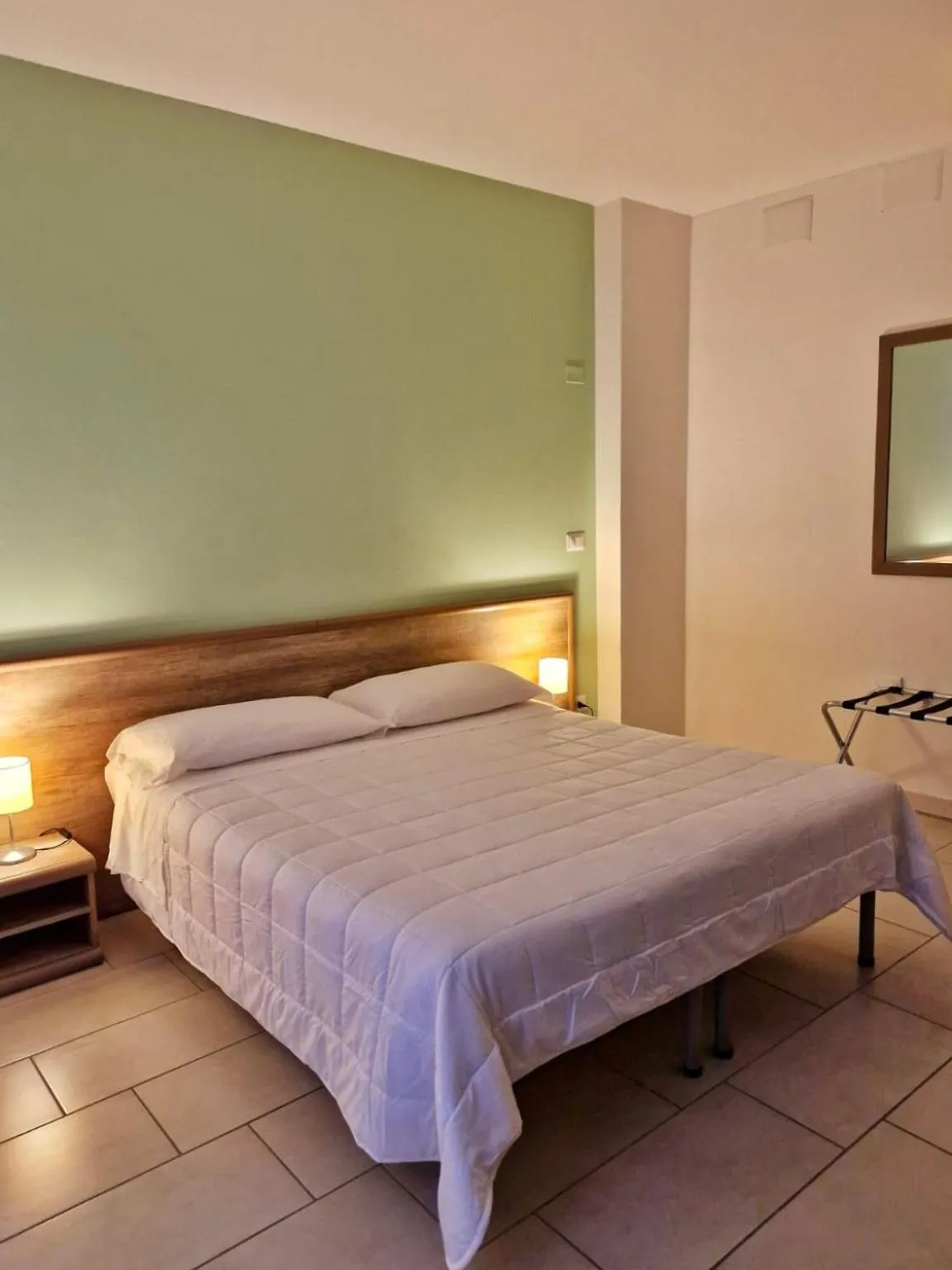 Bed in Mansio Residence & Hotel