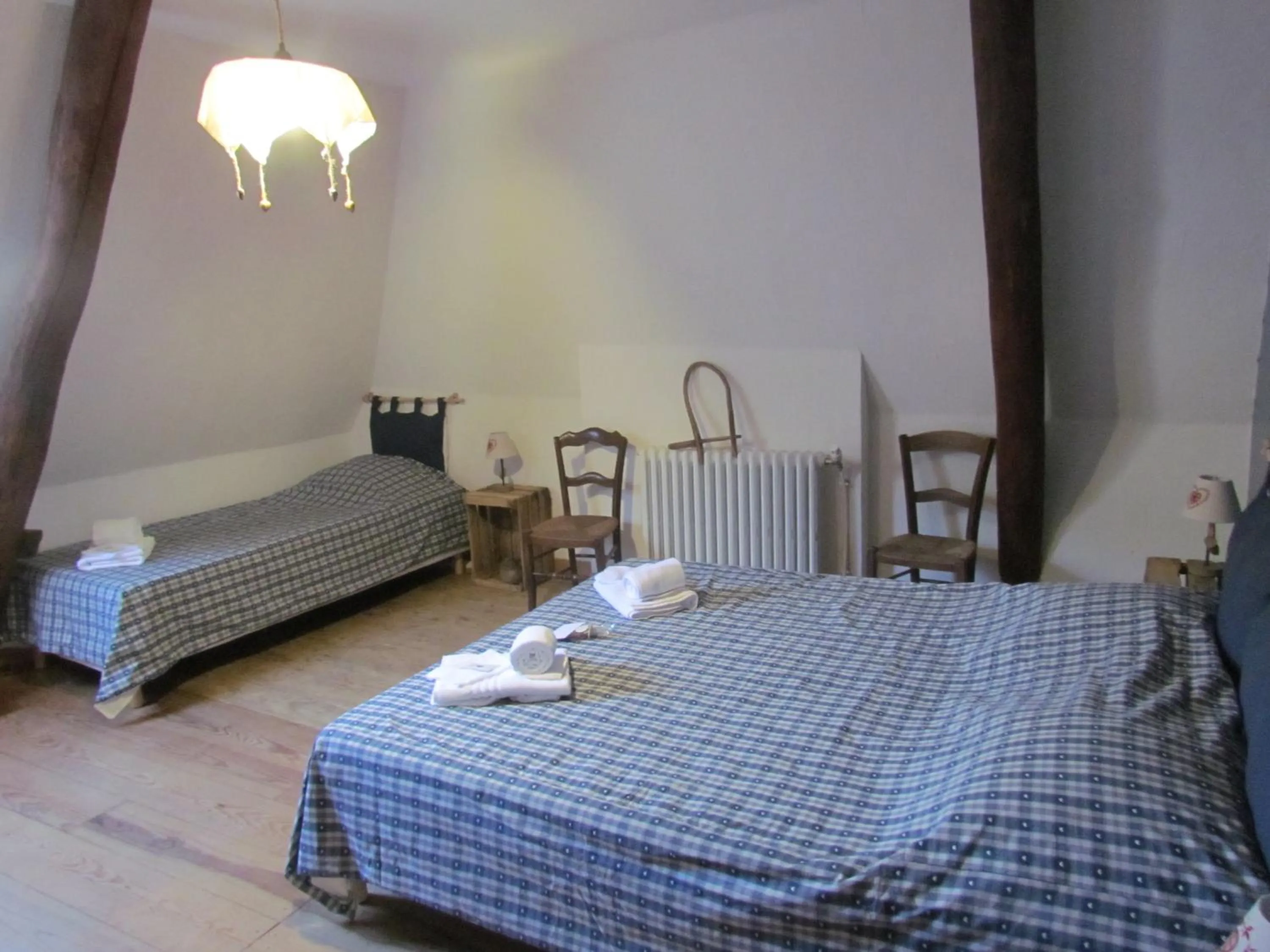 Bed in Le domaine des 3 marmottes Chambres d' hôtes