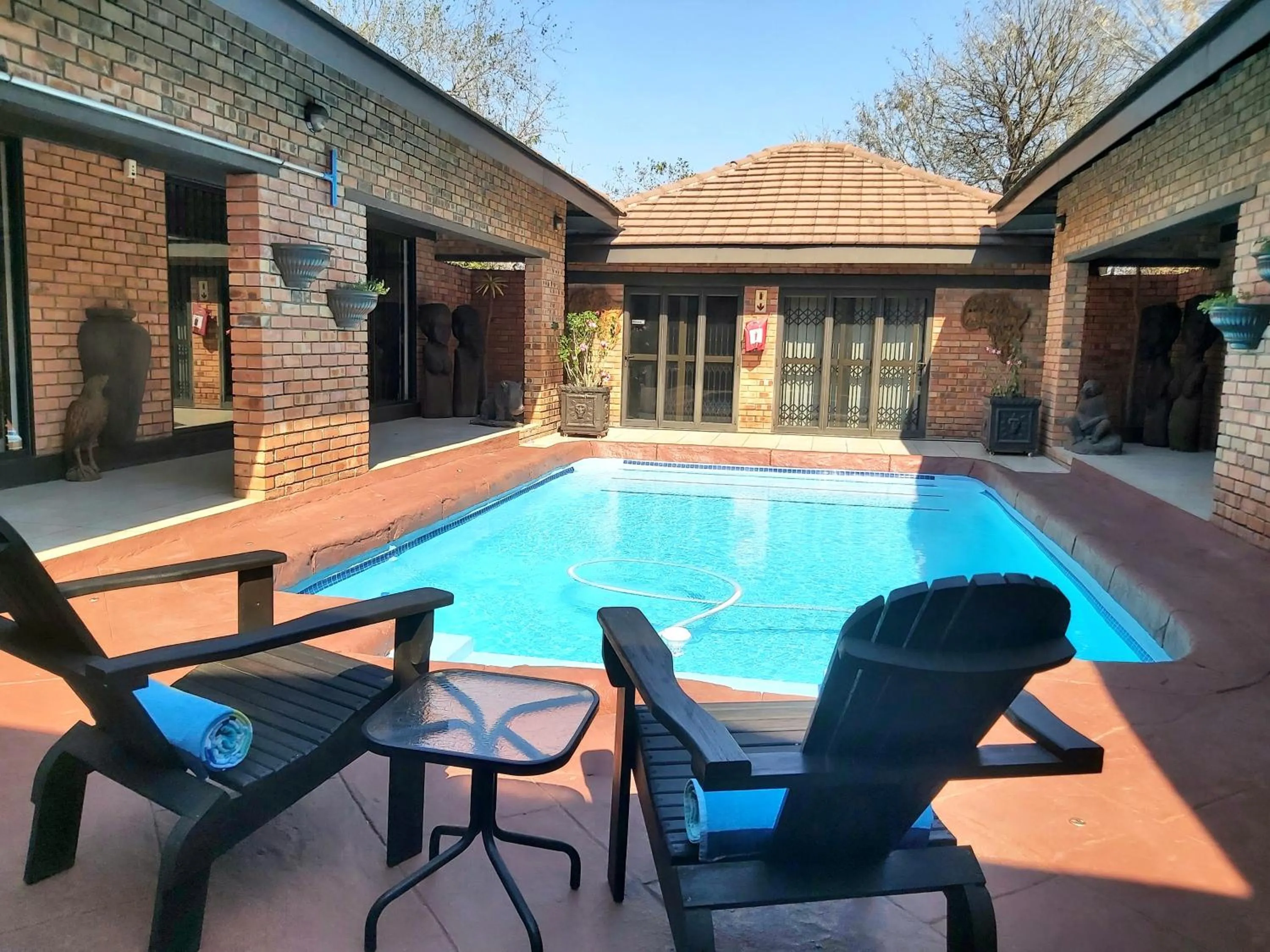 Swimming pool in Ubuntu Bed and Breakfast