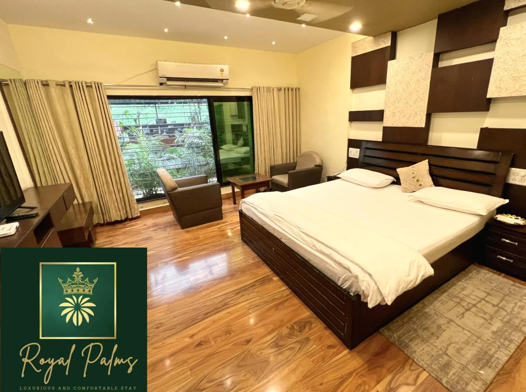 Bed in Royal Palms Luxury Service Apartment