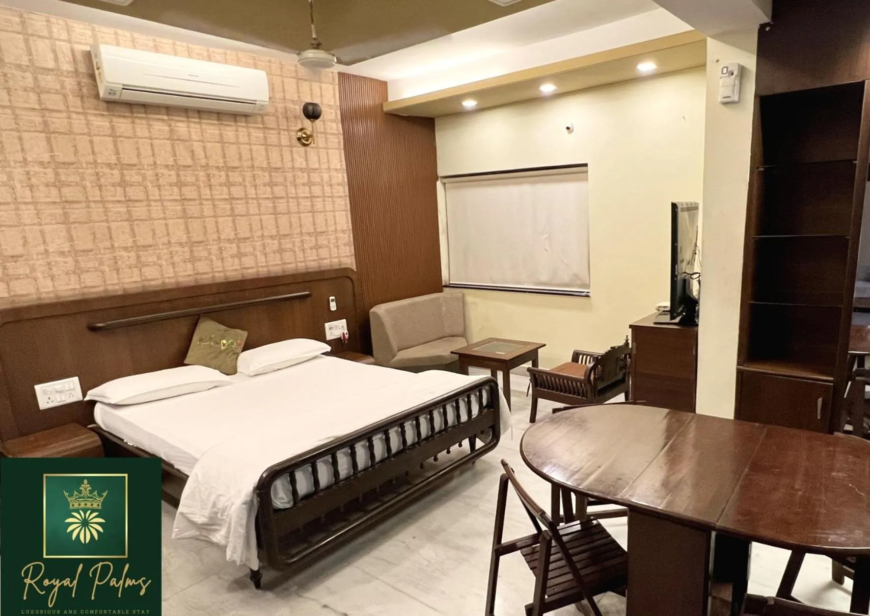 Bed in Royal Palms Luxury Service Apartment