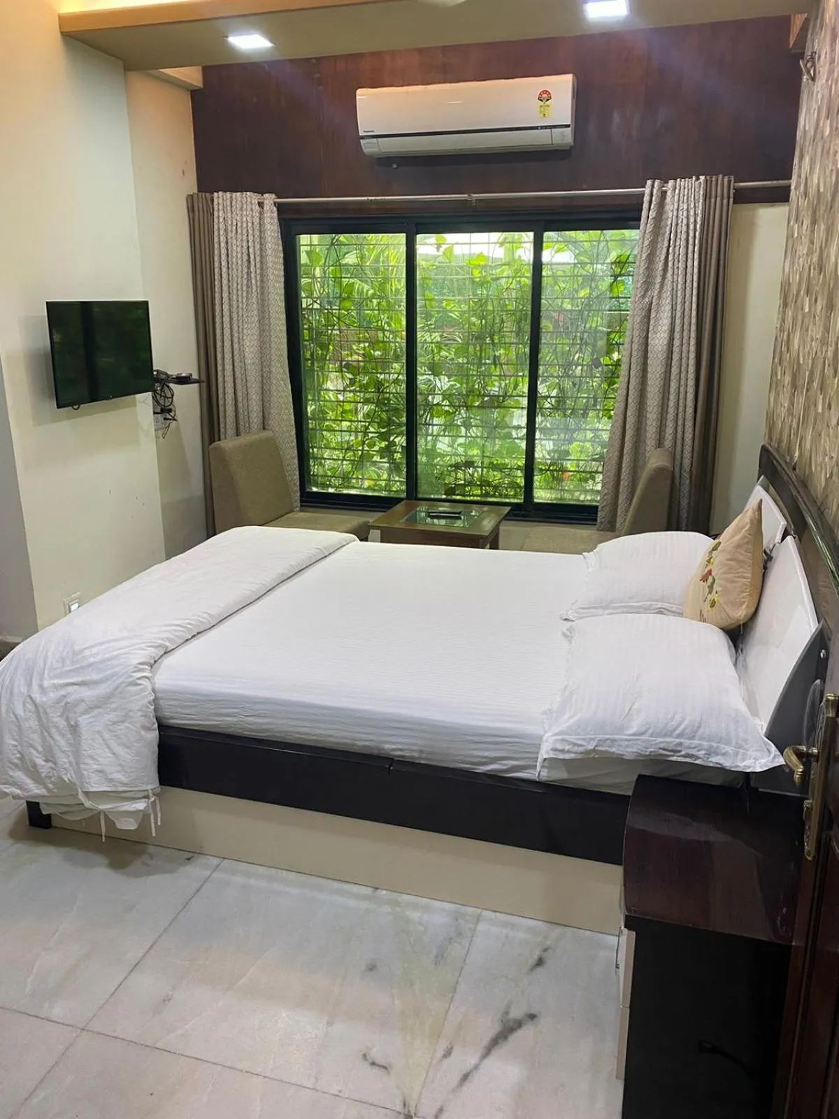 Bed in Royal Palms Luxury Service Apartment