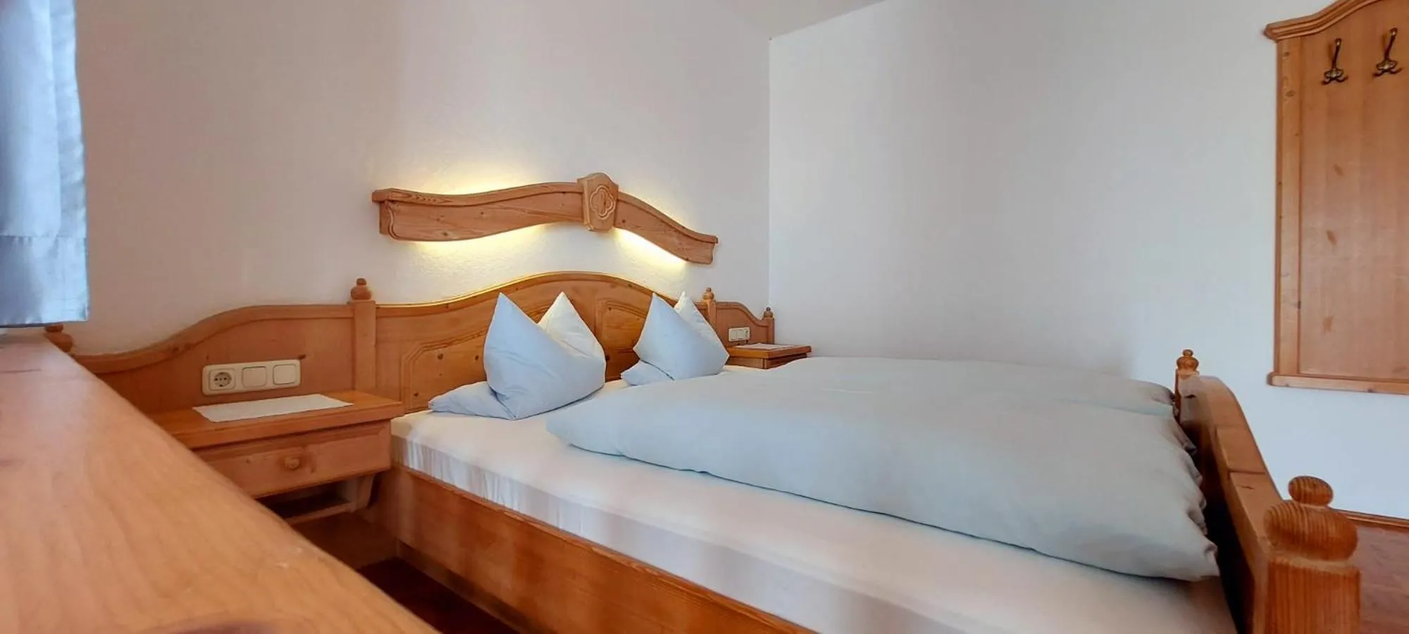 Bed in Hotel-Restaurant Kreuzhuber