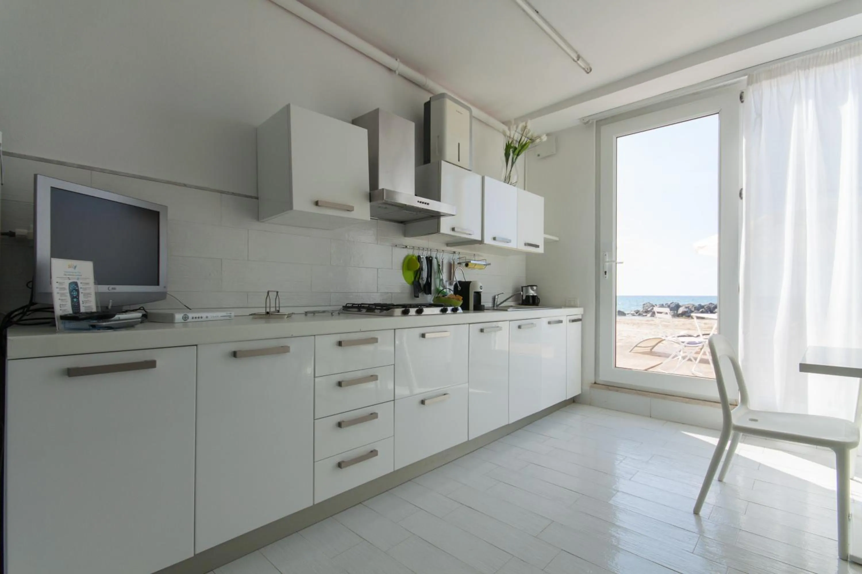 TV and multimedia in Amira Beach Villa by Le Dhome Sicily