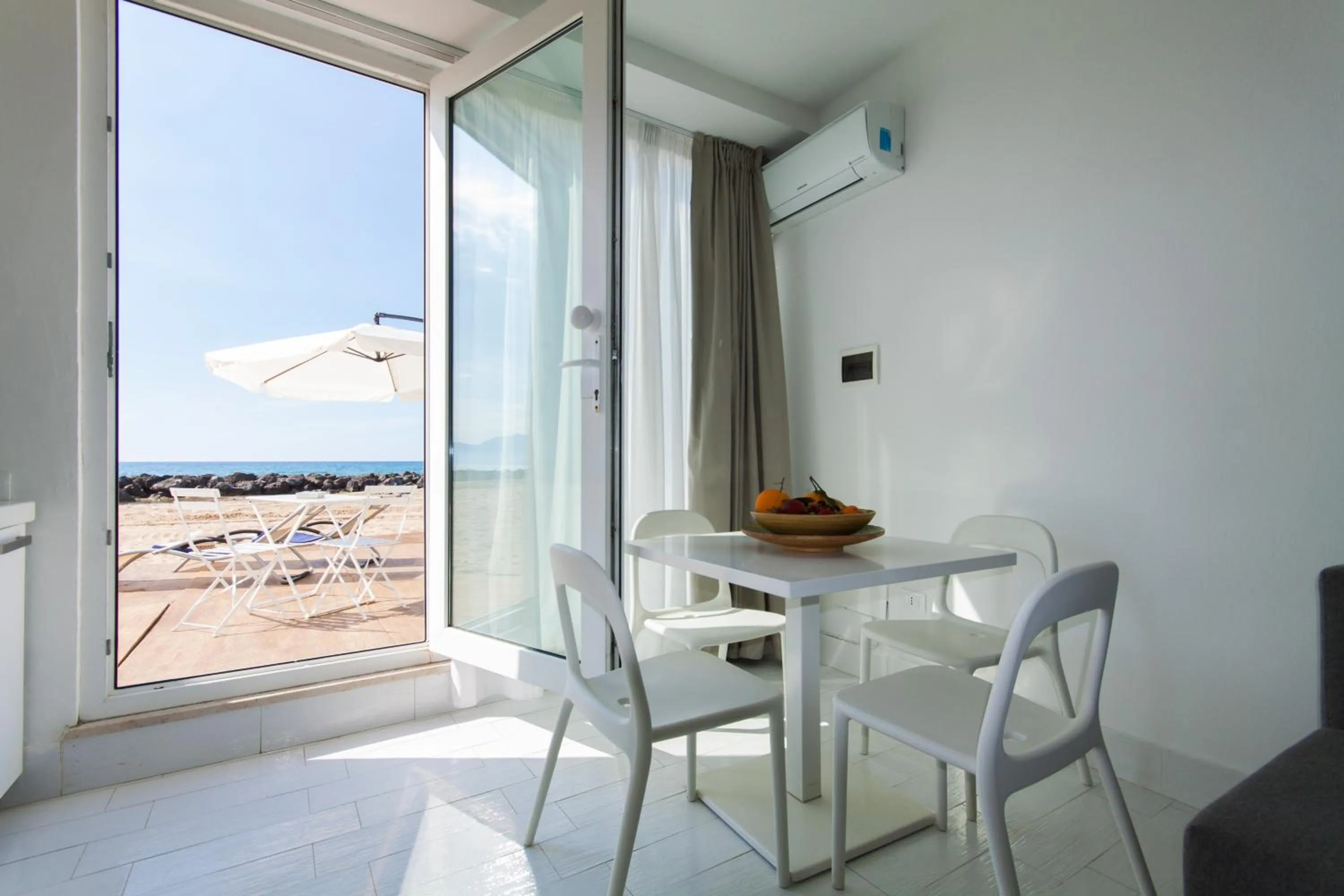 TV and multimedia in Amira Beach Villa by Le Dhome Sicily