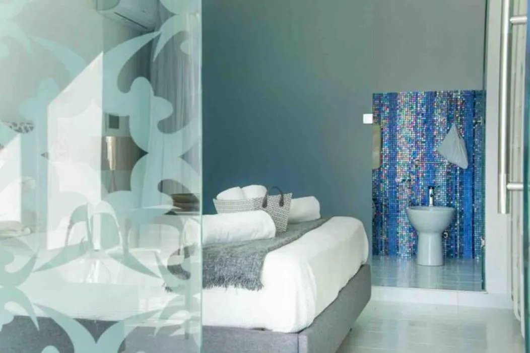 Bed in Amira Beach Villa by Le Dhome Sicily