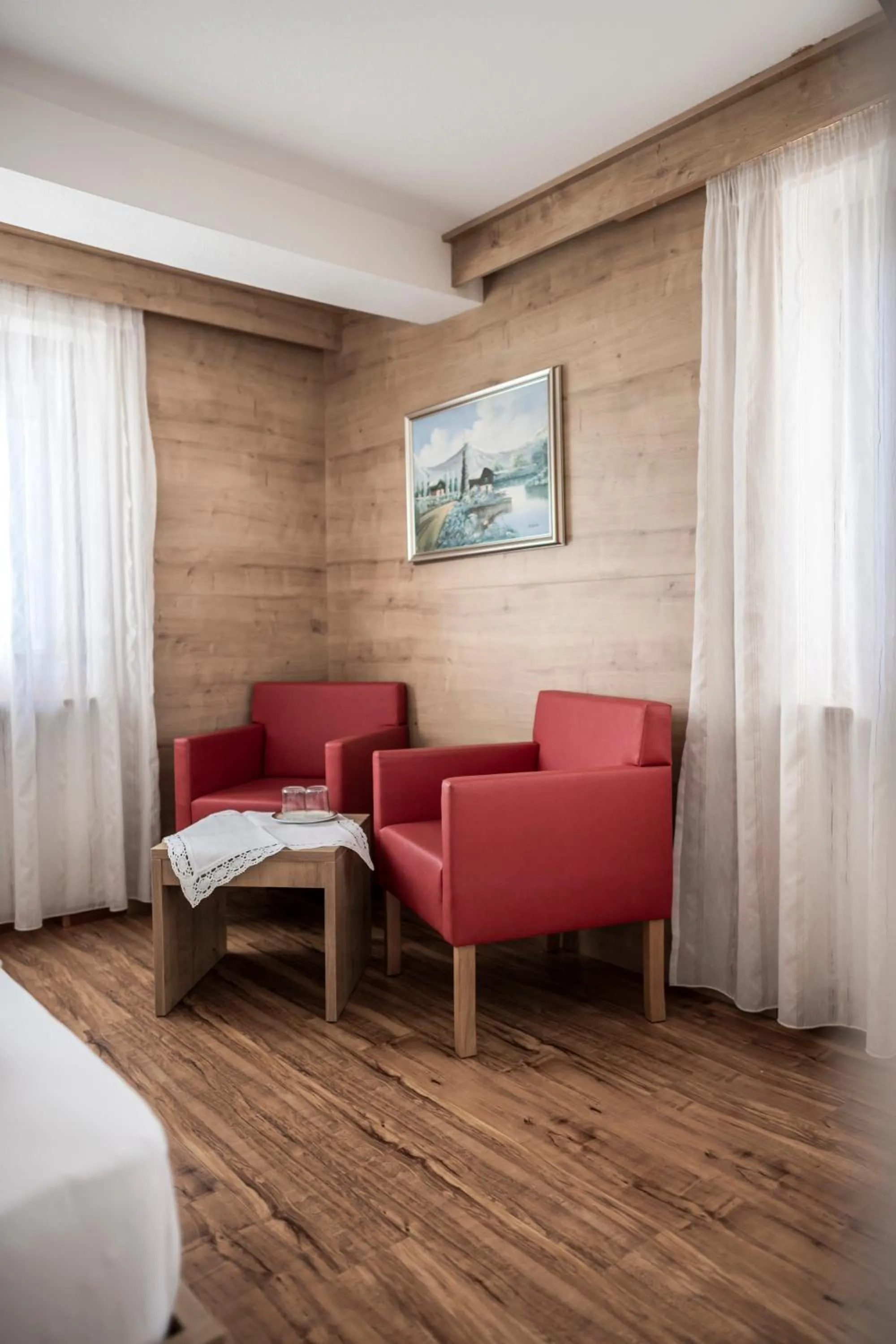 Seating area, Bed in Plan Murin - Authentic Dolomites Hotel