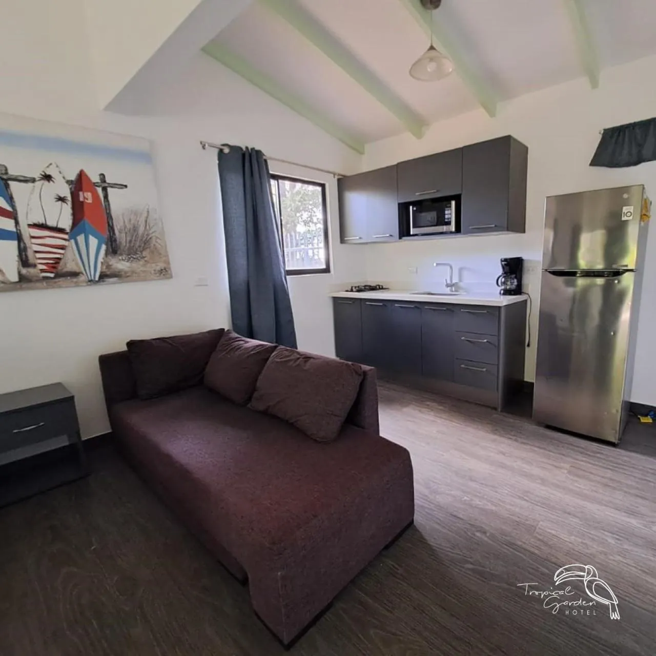 Kitchen or kitchenette in Tropical Garden Hotel