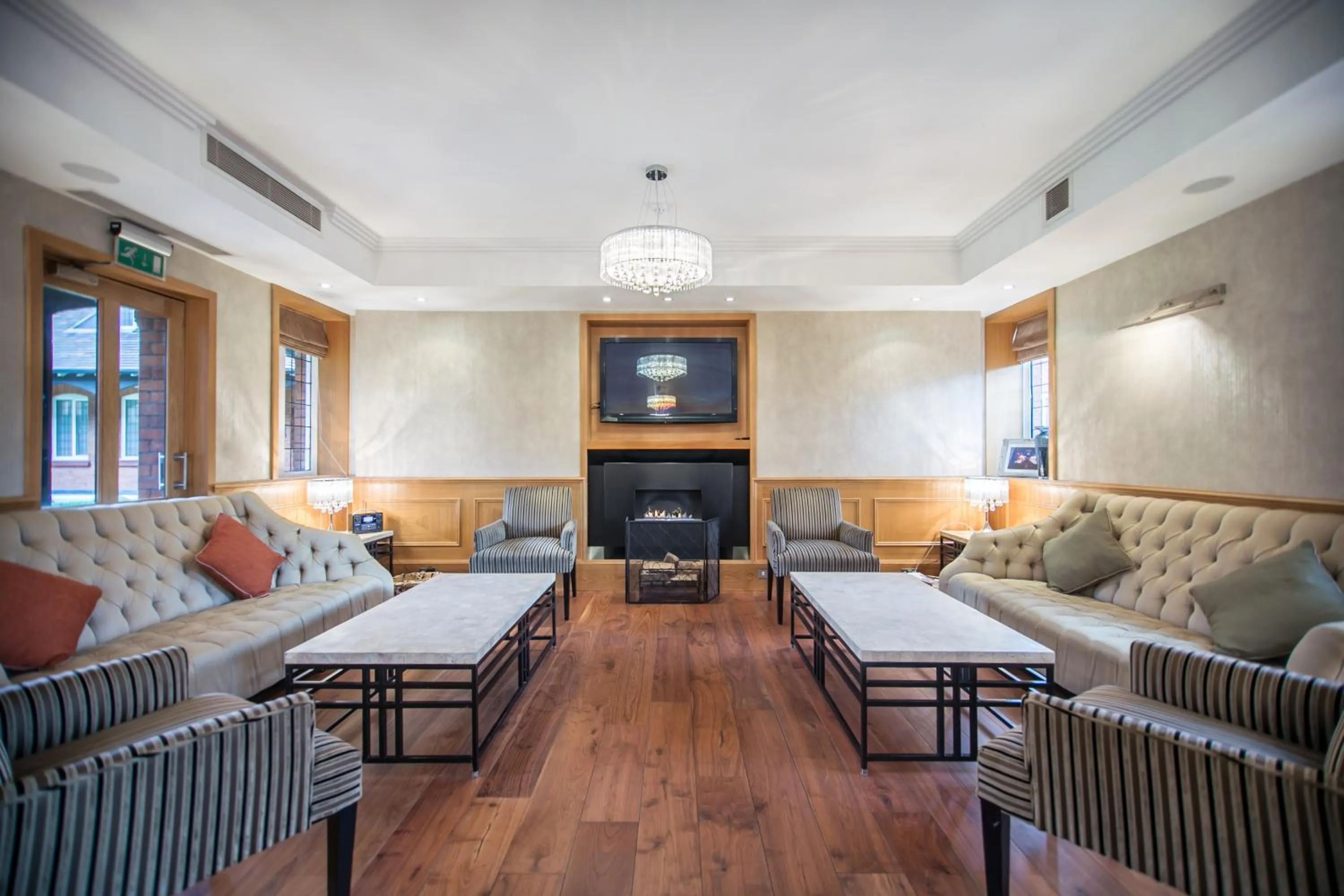 Communal lounge/ TV room in The Pillar Hotel