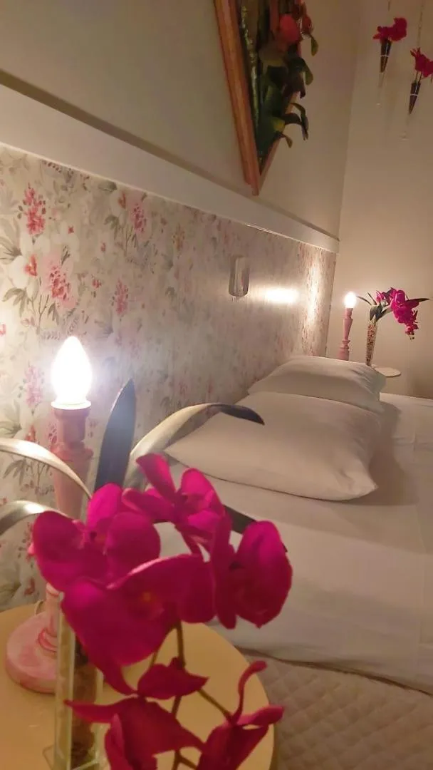 Bed in Hotel Pousada Chalé das Flores