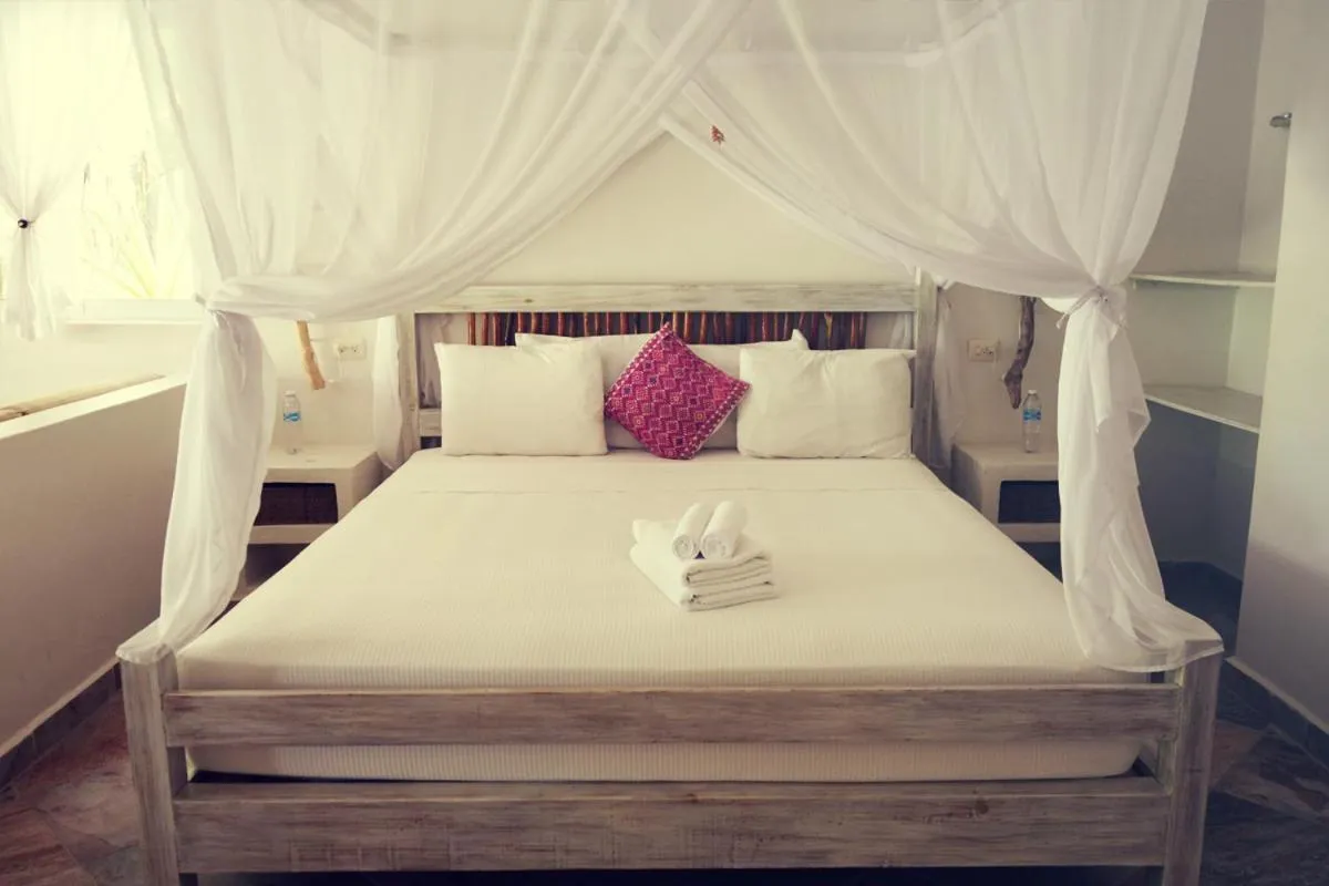Bed in Almaplena Boutique Hotel