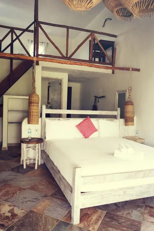 Bed in Almaplena Boutique Hotel