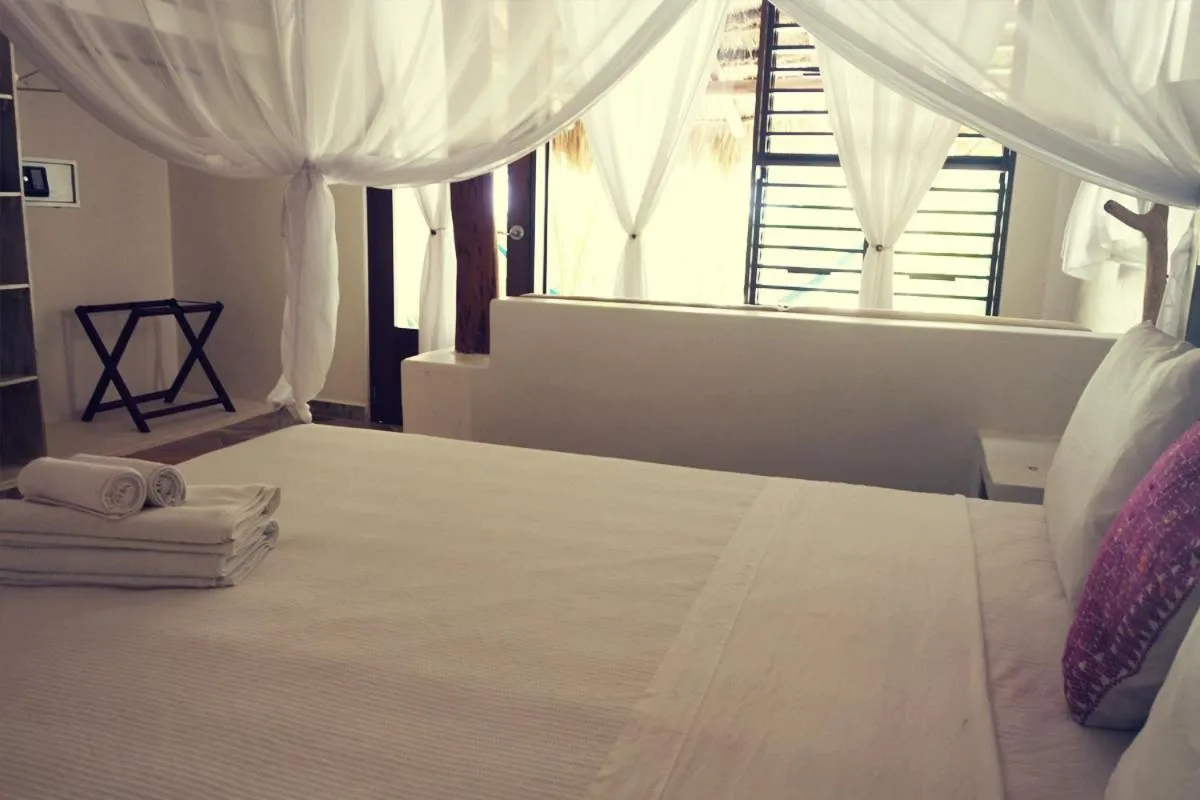 Bed in Almaplena Boutique Hotel