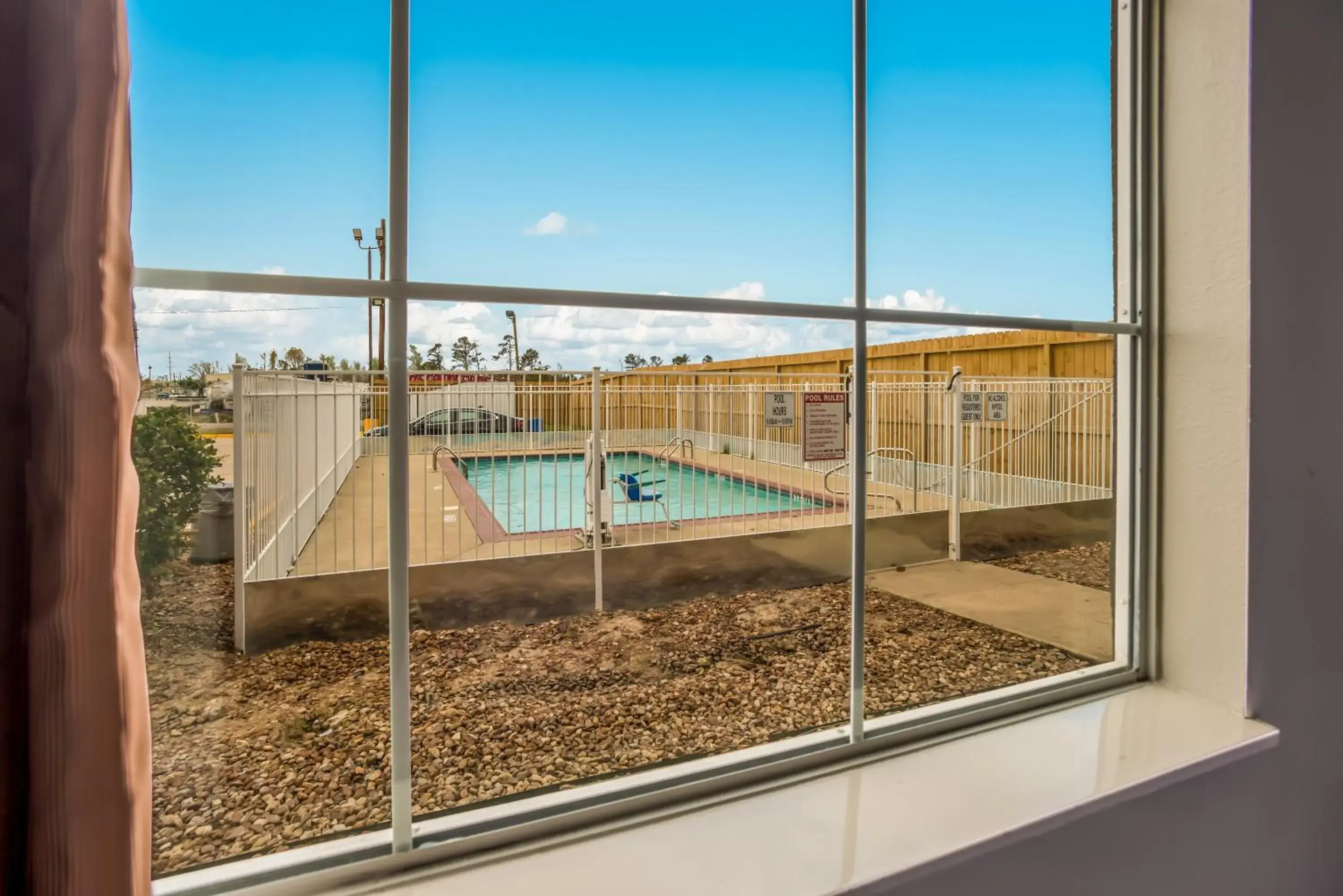 Swimming pool in Red Roof Inn & Suites Lake Charles Swimming pool in Red Roof Inn & Suites Lake Charles