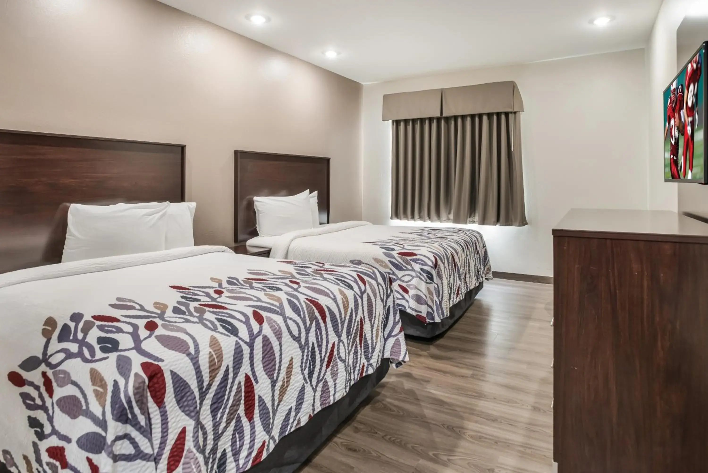 Deluxe Room with Two Queen Beds Disability Access Walk-In Shower Non-Smoking in Red Roof Inn & Suites Lake Charles Deluxe Room with Two Queen Beds Disability Access Walk-In Shower Non-Smoking in Red Roof Inn & Suites Lake Charles