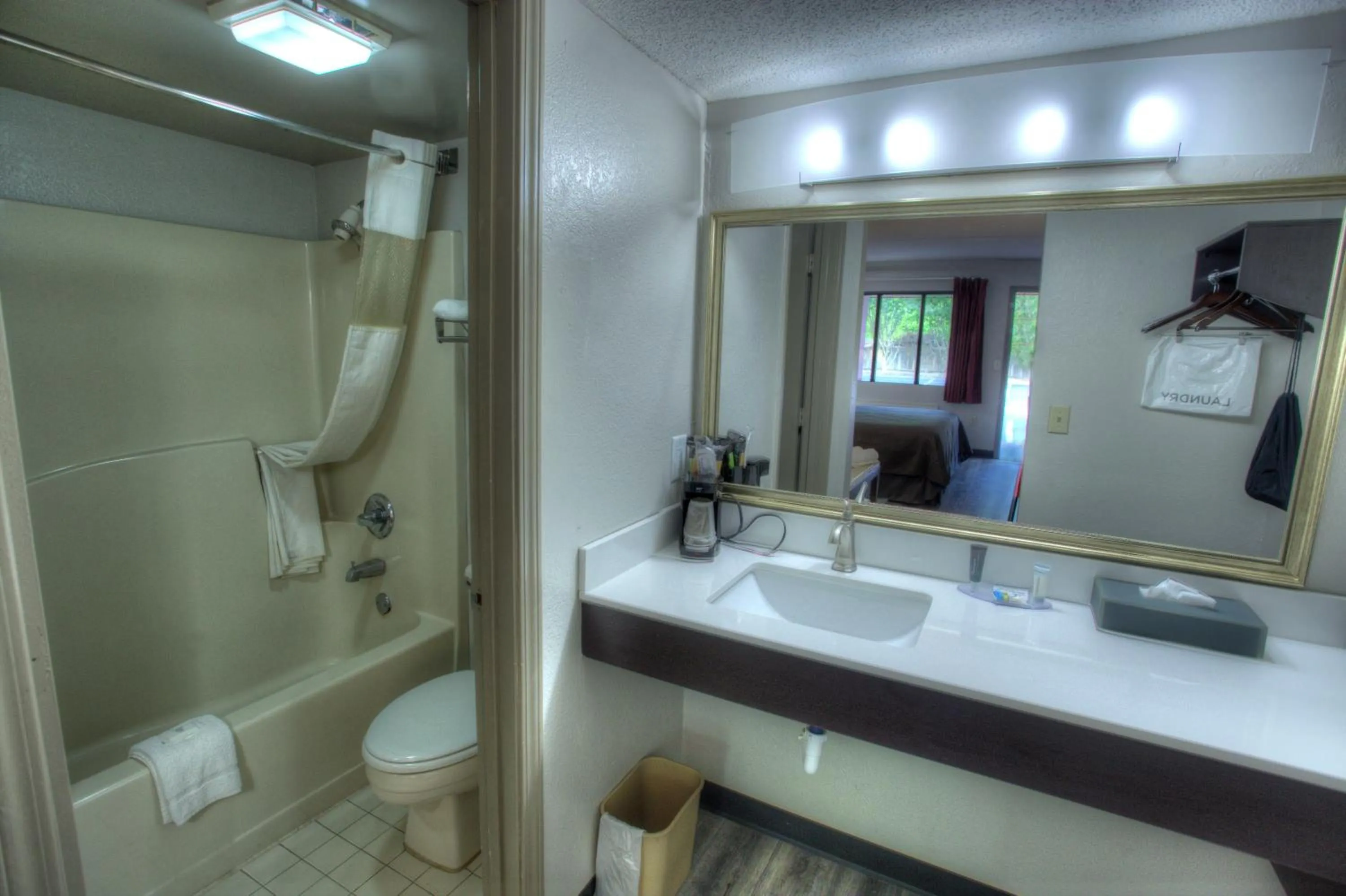 Toilet in Budgetel Inn and Suites Plus Helen