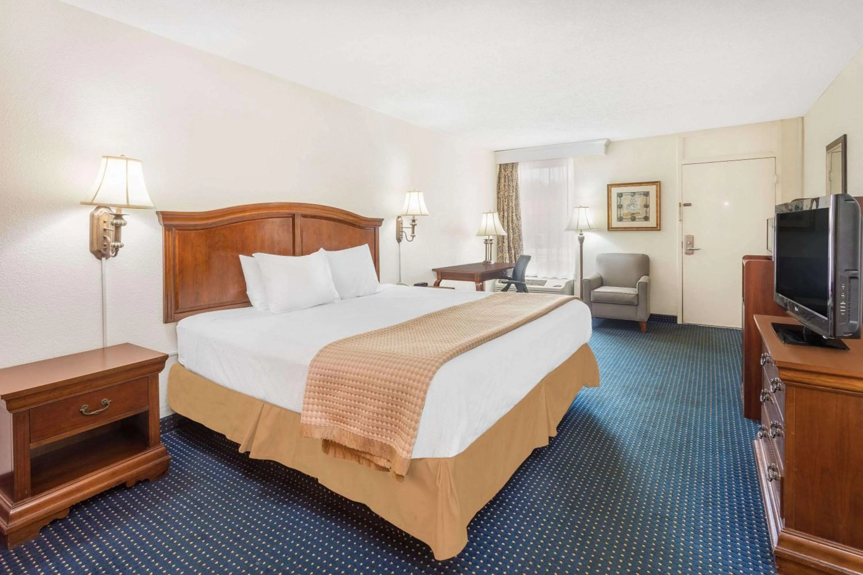 Photo of the whole room, Bed in Baymont by Wyndham Rocky Mount I-95