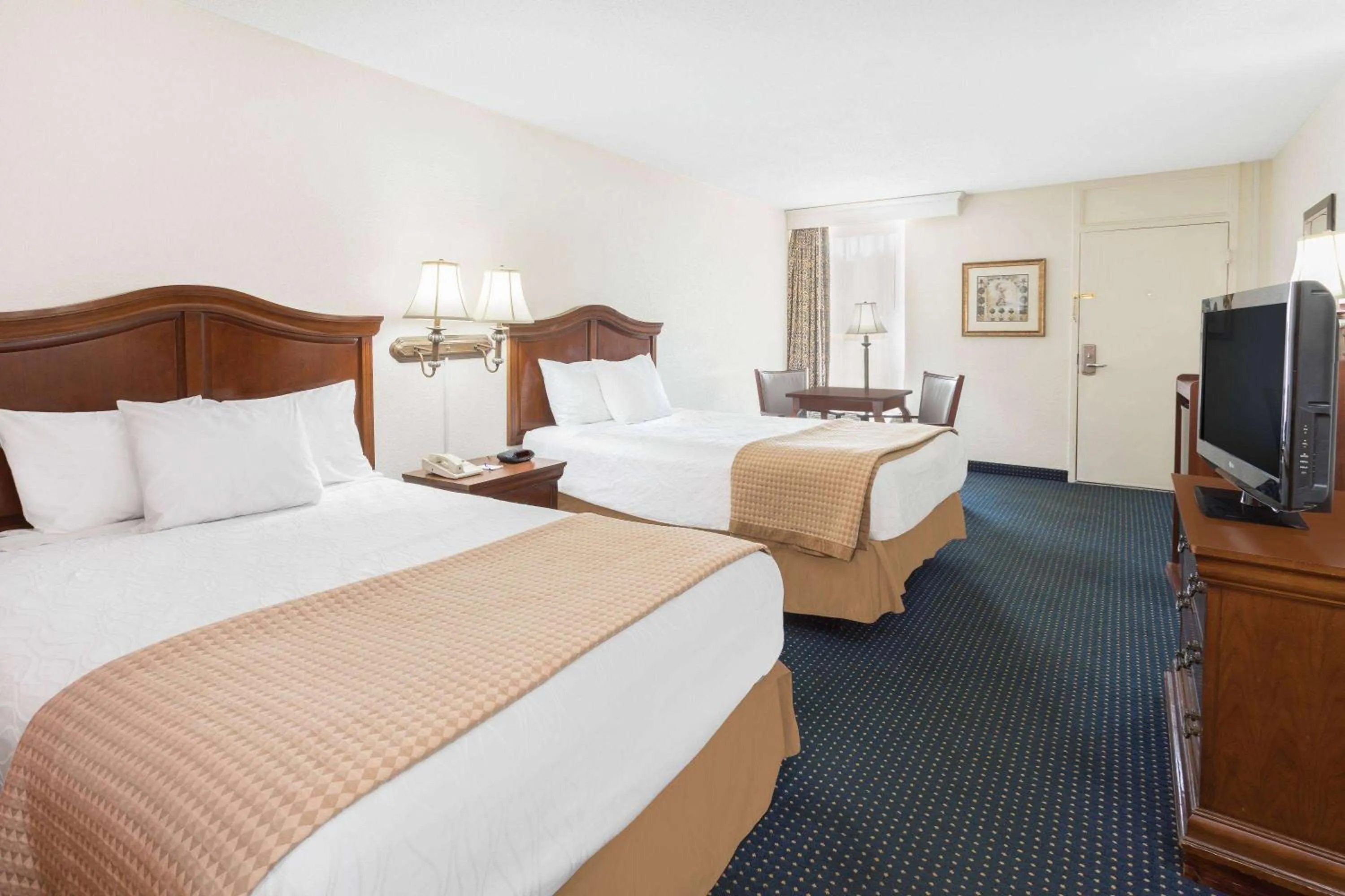Photo of the whole room, Bed in Baymont by Wyndham Rocky Mount I-95