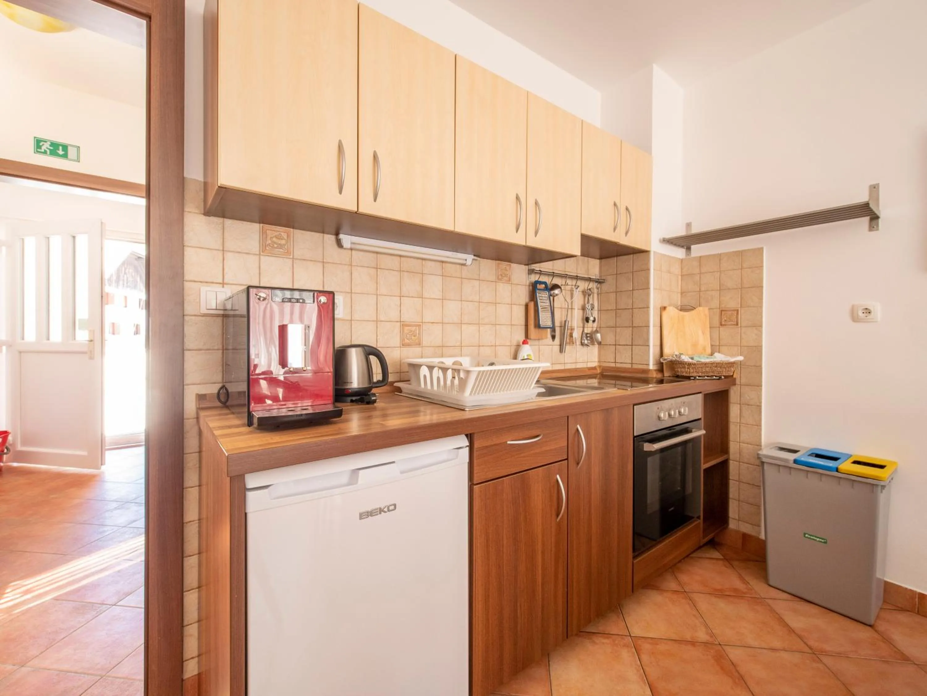 Kitchen or kitchenette in Berghi Hotel and Apartments