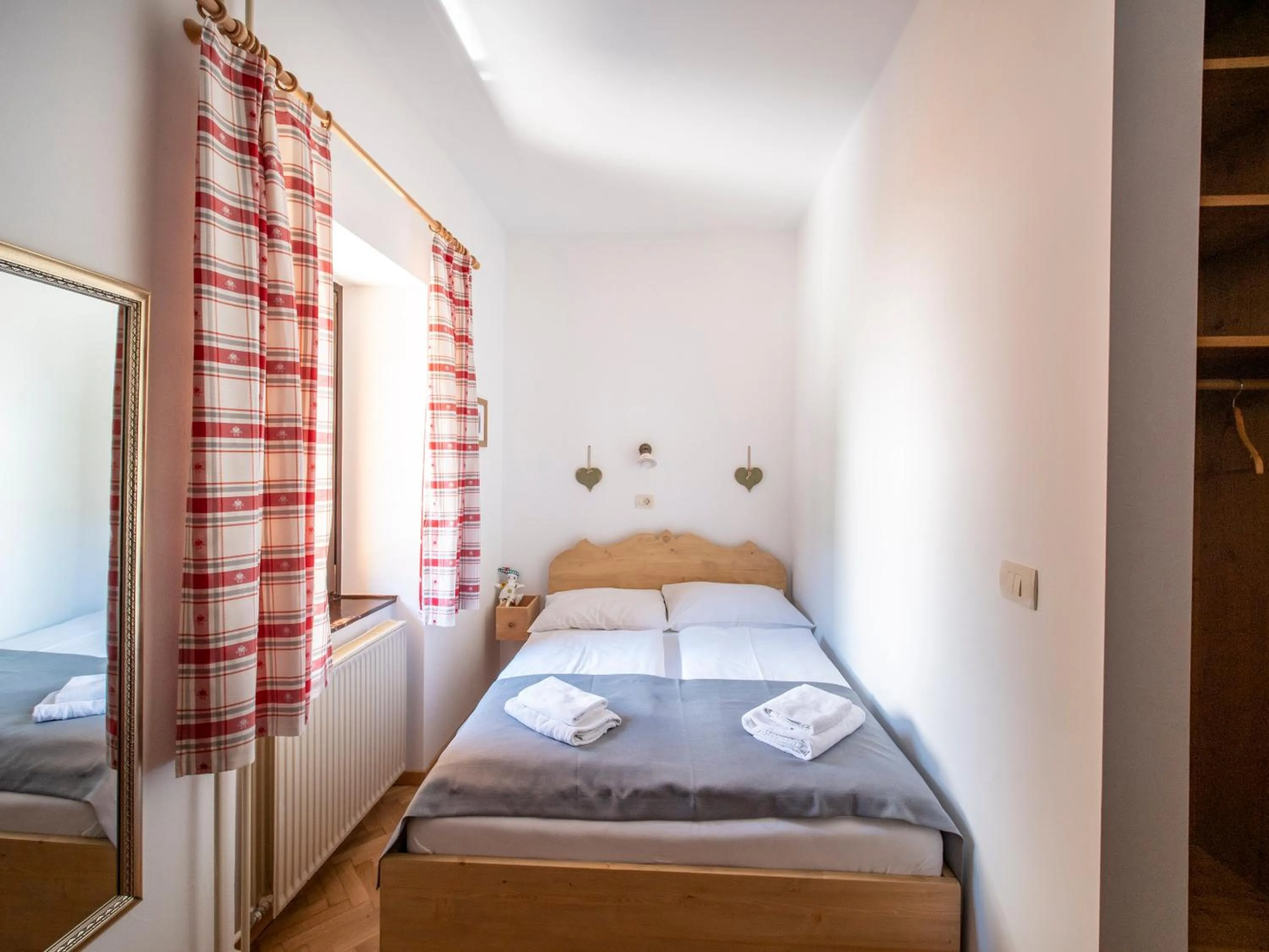 Bed in Berghi Hotel and Apartments