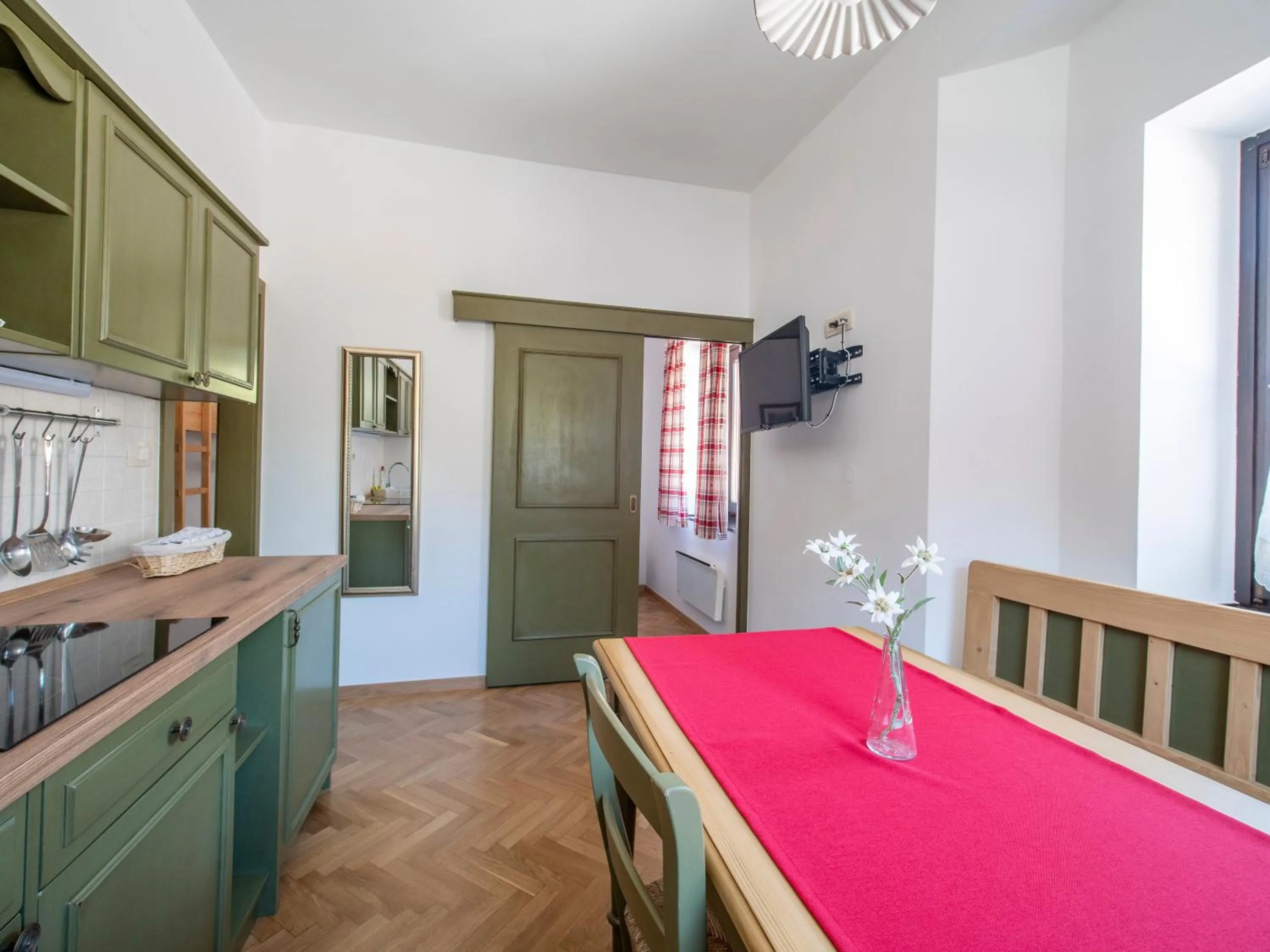 Kitchen or kitchenette in Berghi Hotel and Apartments