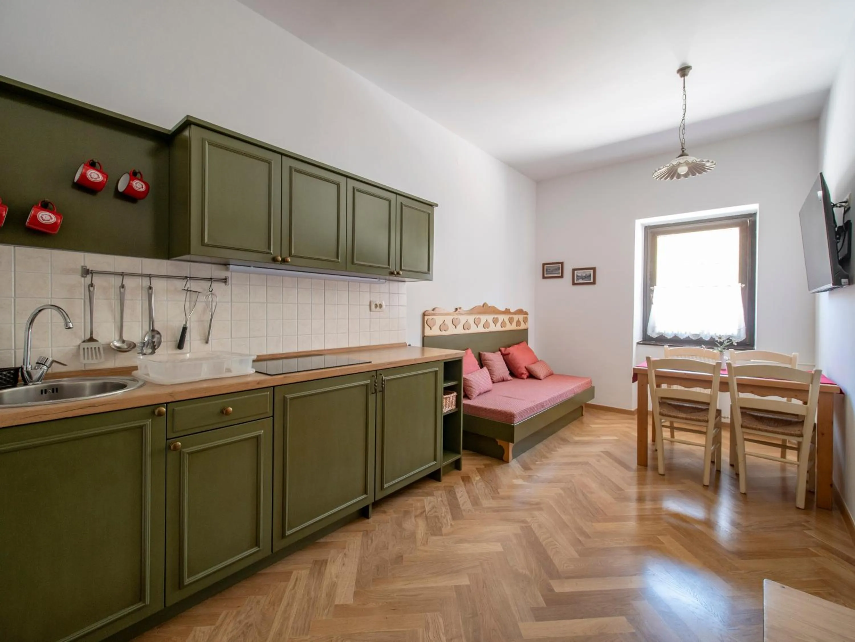 Kitchen or kitchenette in Berghi Hotel and Apartments
