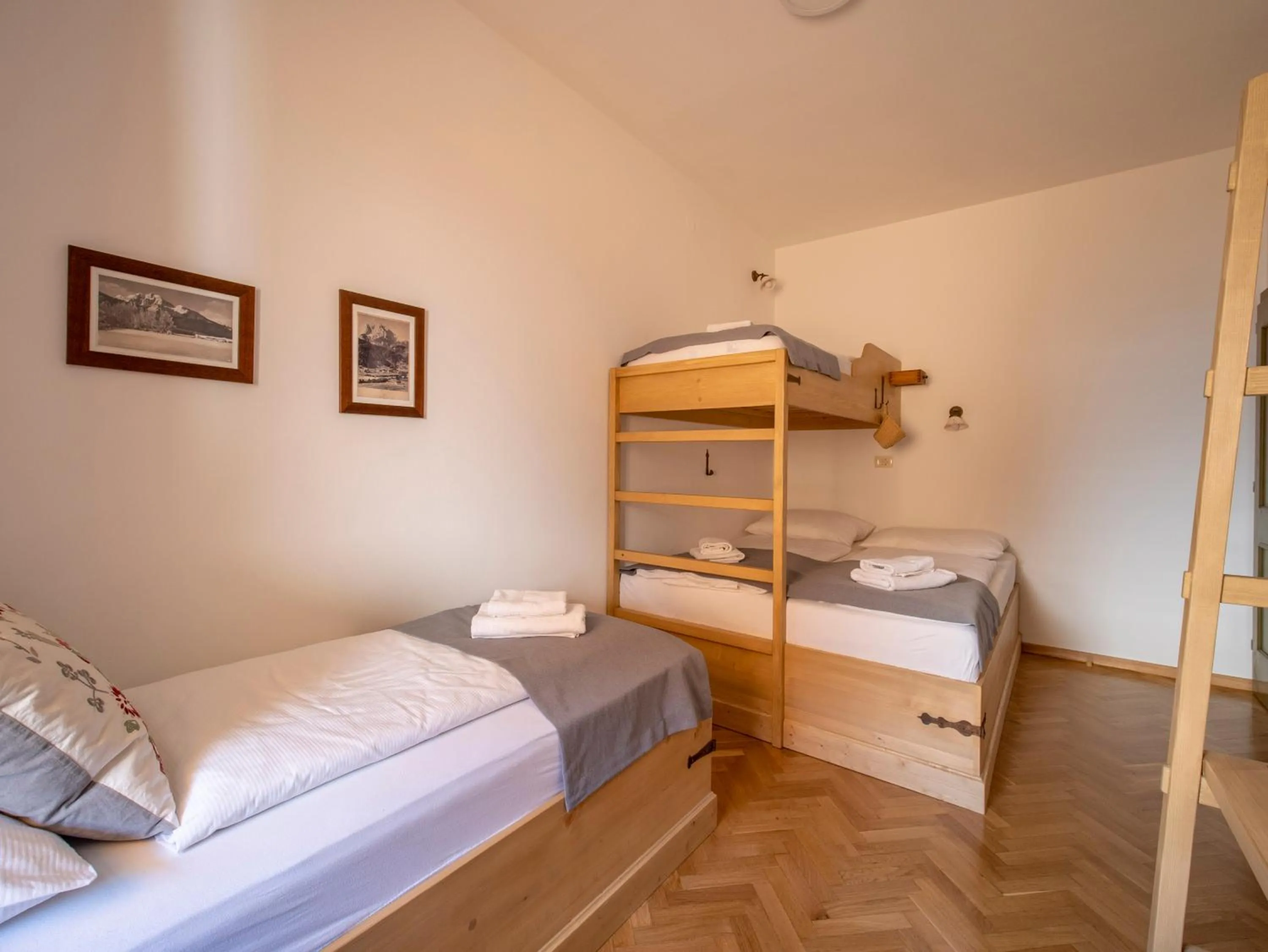 Bed in Berghi Hotel and Apartments