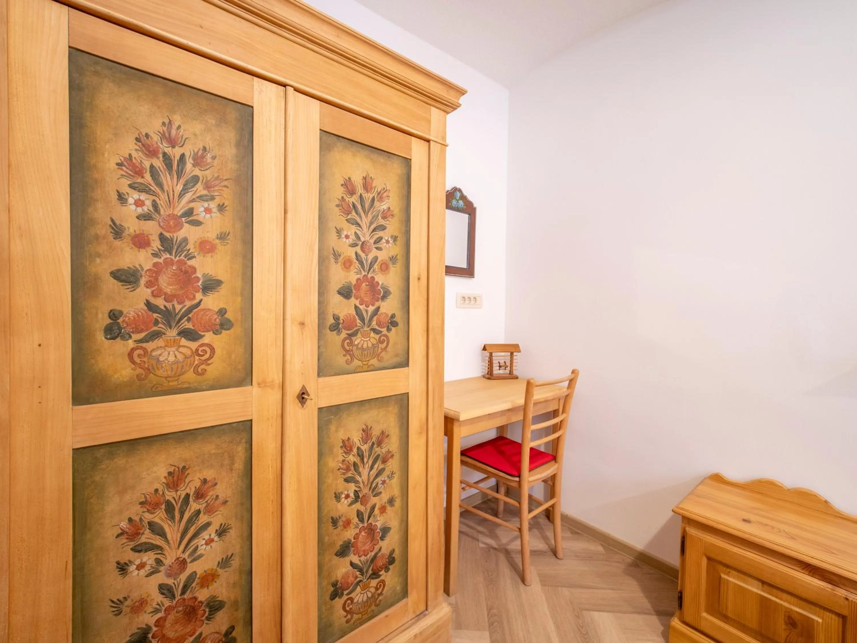 Bedroom in Berghi Hotel and Apartments