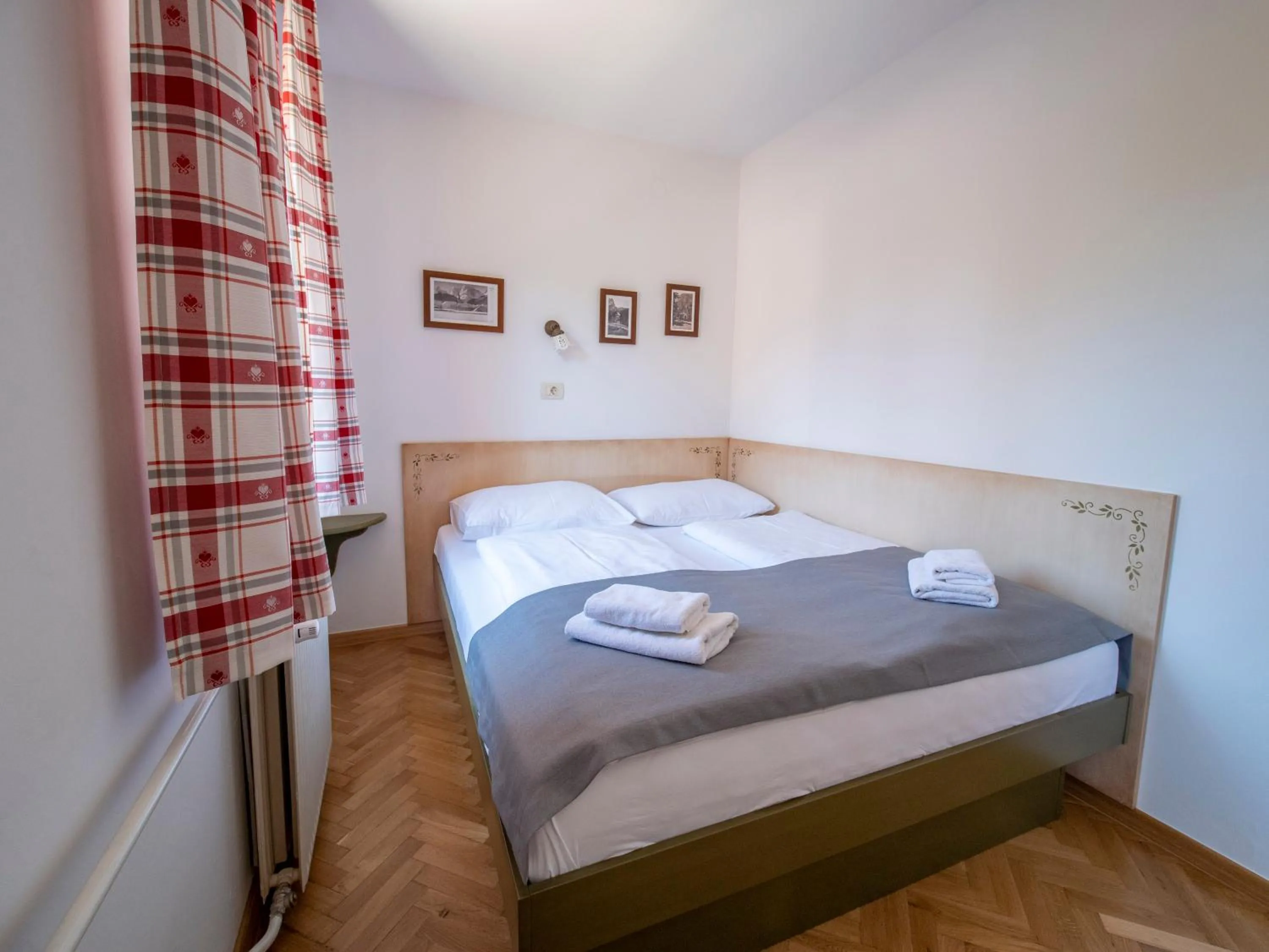 Bed in Berghi Hotel and Apartments