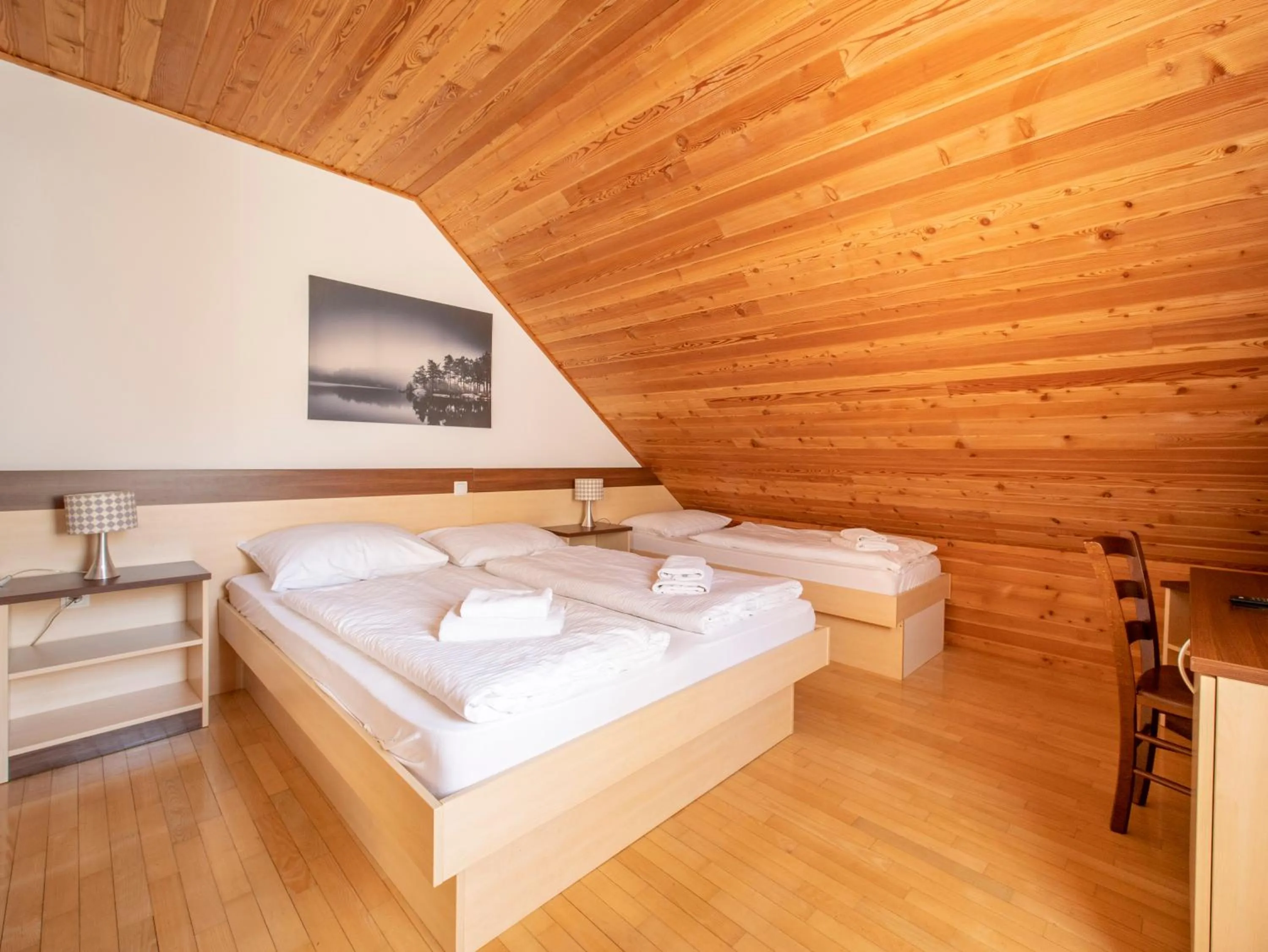 Bed in Berghi Hotel and Apartments